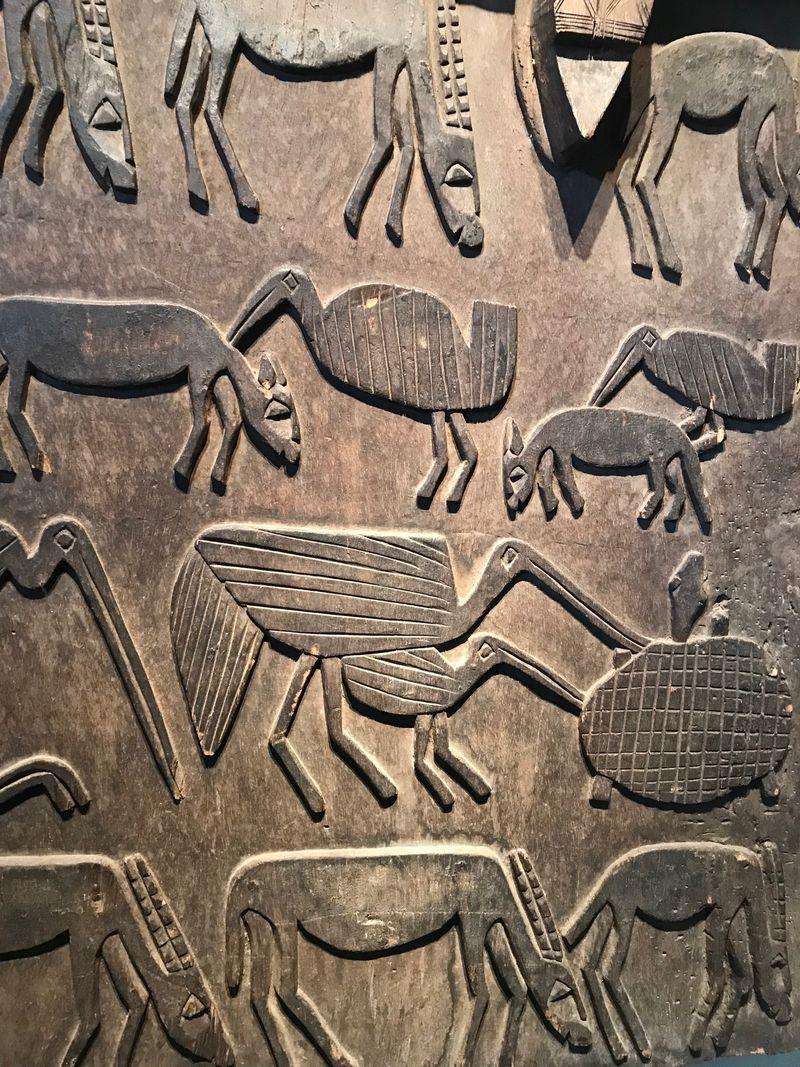 20th Century Senufo Granary Door Depicting Series of Animals and Masks For Sale