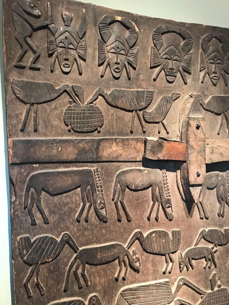 Wood Senufo Granary Door Depicting Series of Animals and Masks For Sale