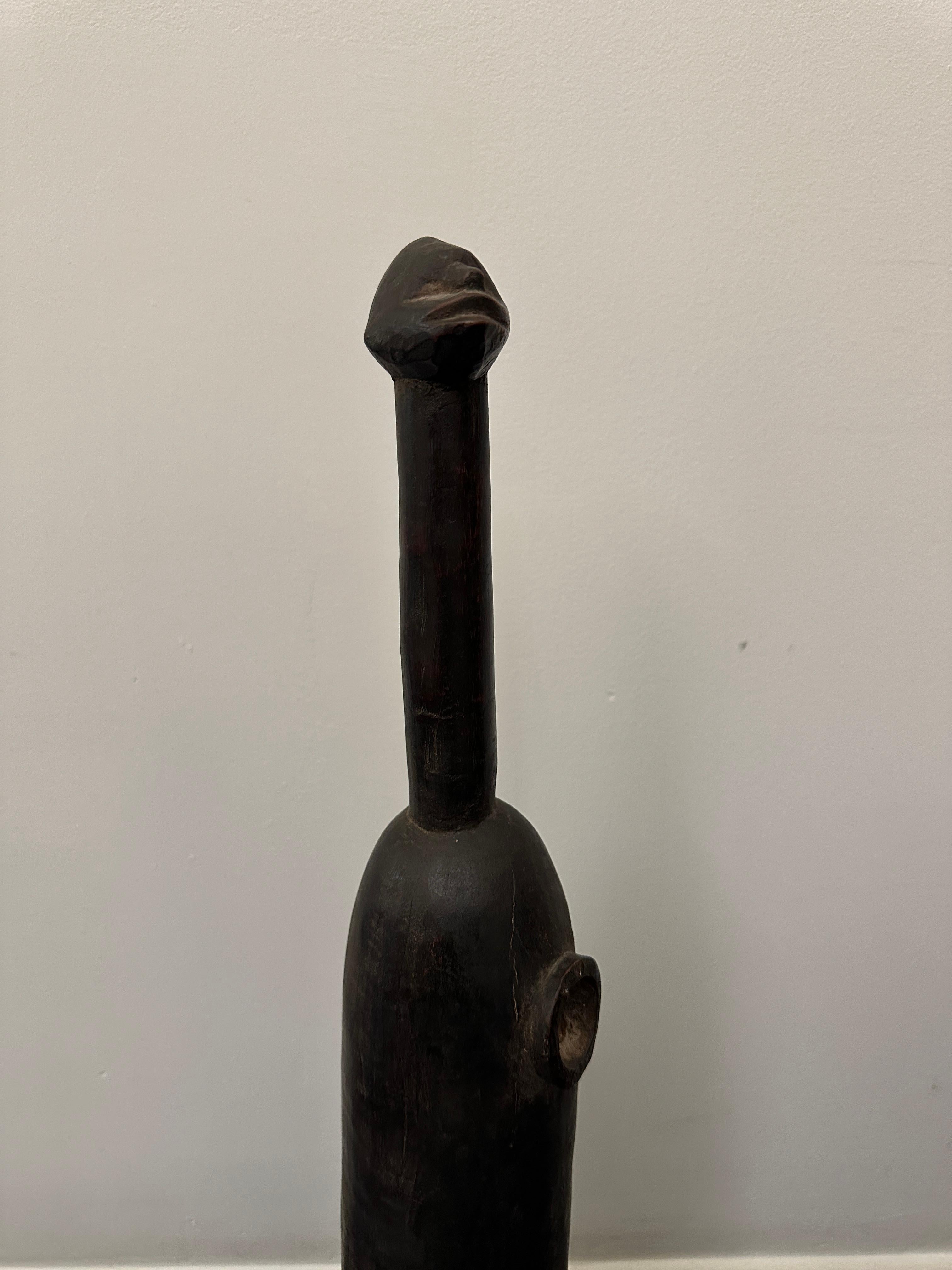 Sculpté à la main Flute rituel Senufo en bois sculpté à la main en vente