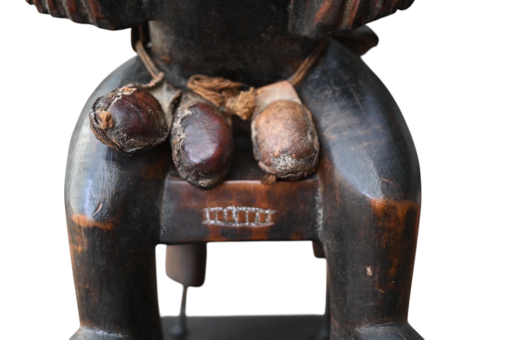 Senufo, Costa de Marfil, antropomorfo sentado  figura femenina en Bueno estado para la venta en Bilzen, BE