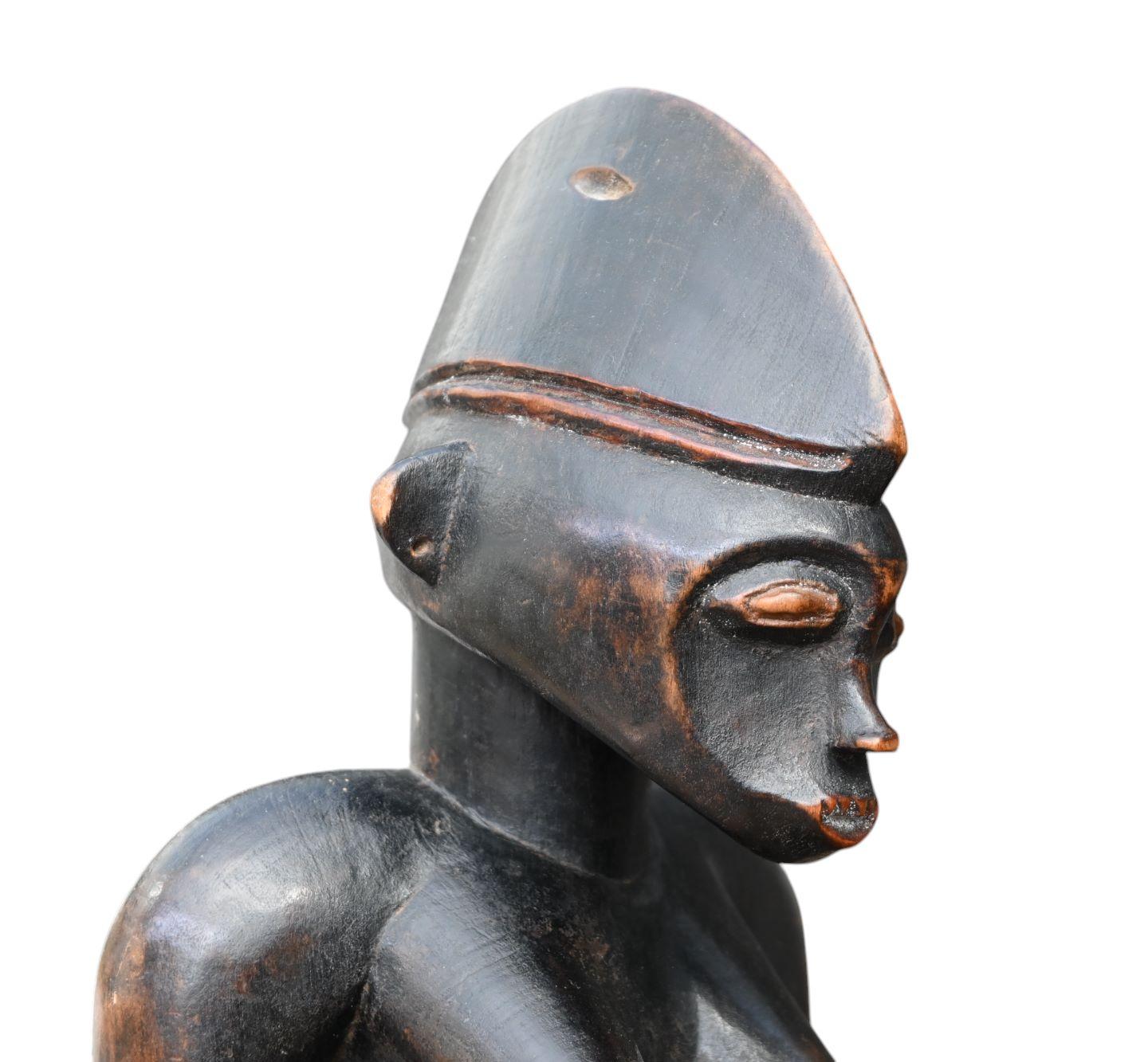 Senufo, Costa de Marfil, antropomorfo sentado  figura femenina en venta 1