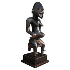Senufo, Ivory Coast, anthropomorphic seated  female figure