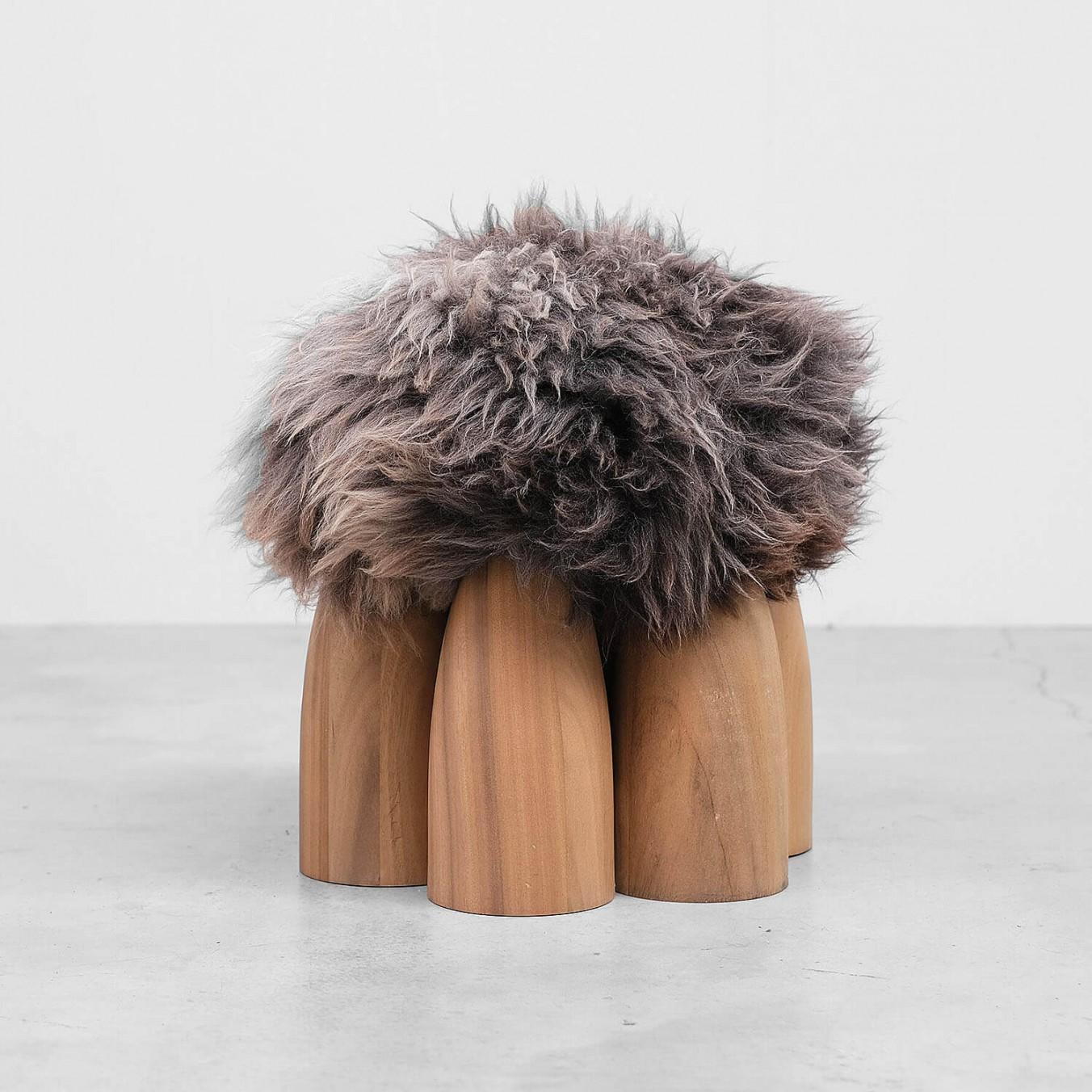 Senufo ottoman in African walnut by Arno Declercq
Made African walnut and sheep wool. (ask for different wool colors)
*Fur color based on availability
Measures: L 45 cm x W 45 cm x H 40 cm, L 17.7” x W 17.7” x H 15.7”

Material: African walnut

Made