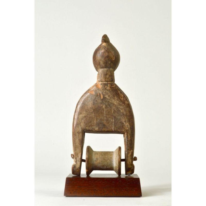 Ivorian Senufo Pulley with Bird Head Finial in Wood For Sale