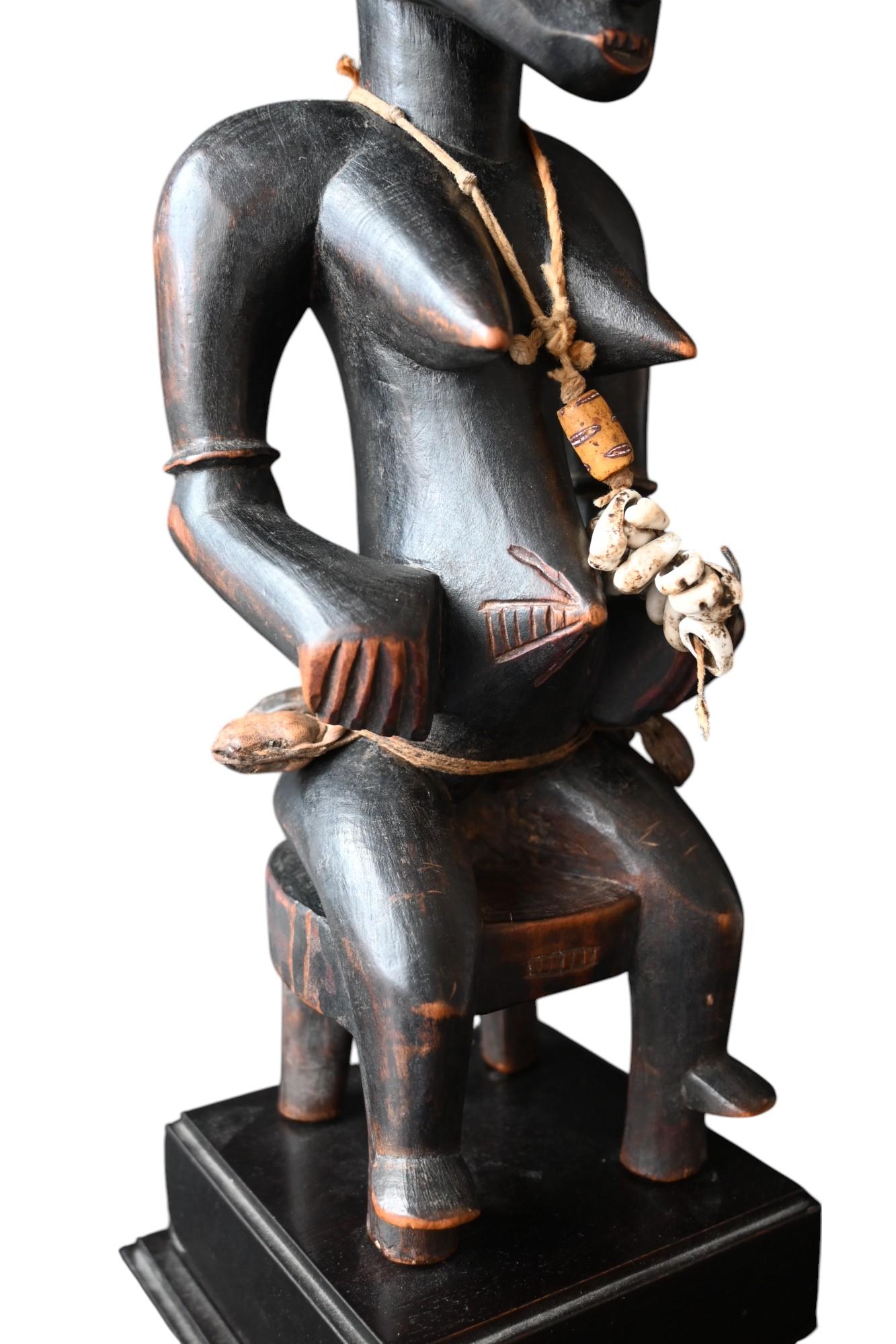 Hand-Carved Senufo Seated Female Figure – Early 20th Century For Sale