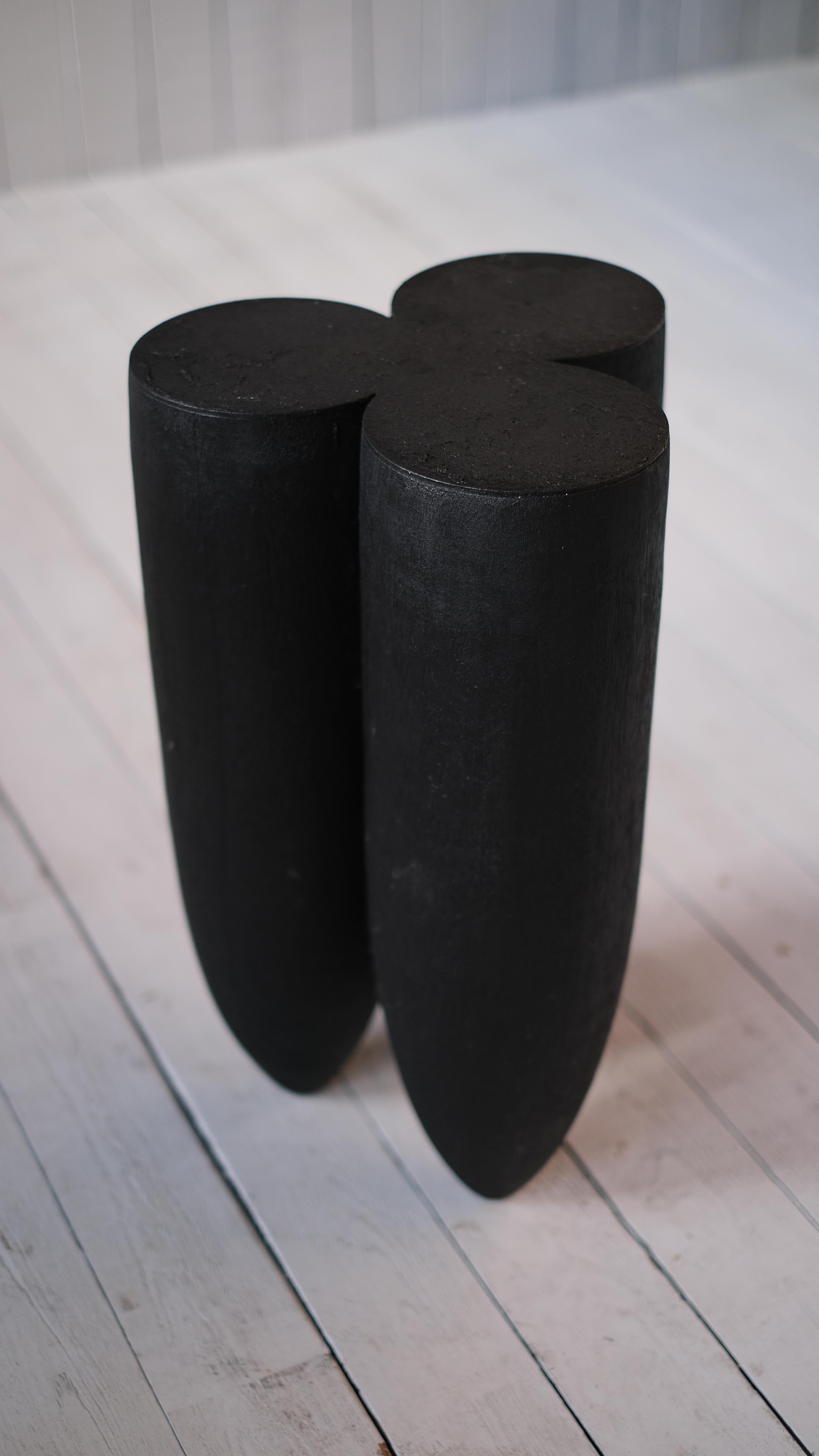 Senufo stool in Iroko wood by Arno Declercq.
Stool or side table.
Domensions: H 50 cm x D 30 cm / H 17.9” H x D 11.8”.
Materials: burned and waxed Iroko wood, burned steel.
Signed by Arno Declercq.

Arno Declercq
Belgian designer and art