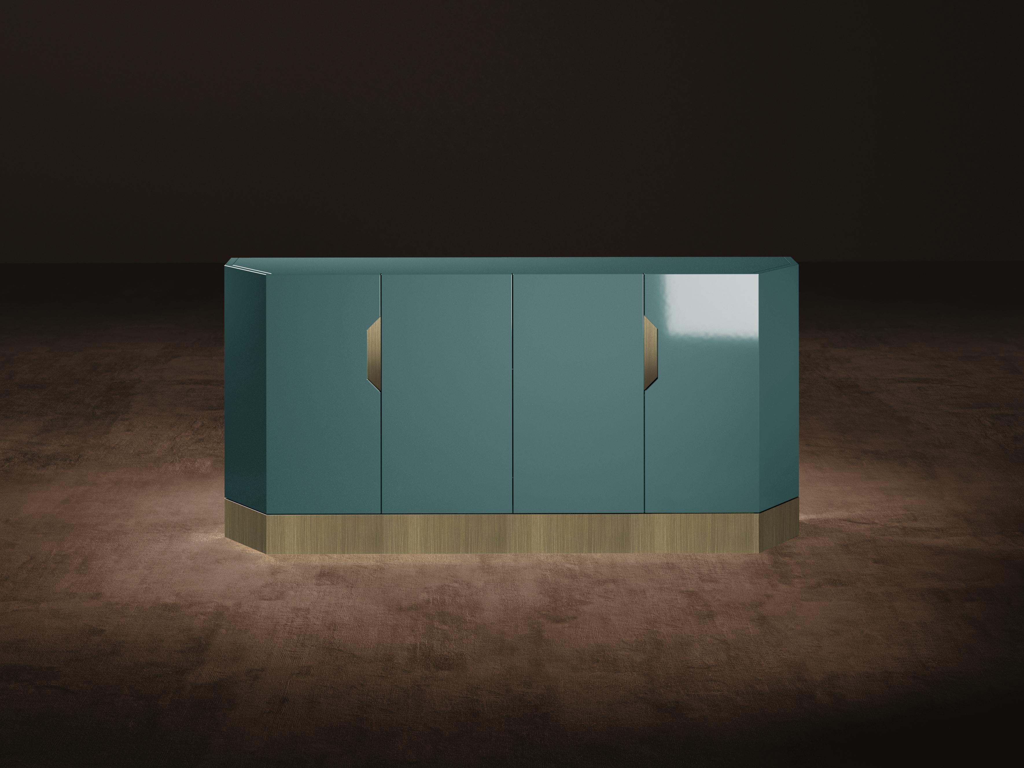 Senza fine sideboard is part of the Senza fine Capsule collection.
Senza fine sideboard is a doors cabinet with a wooden structure. The container, of hexagonal shape, has four front doors in lacquered wood with metal pockets for opening in the two