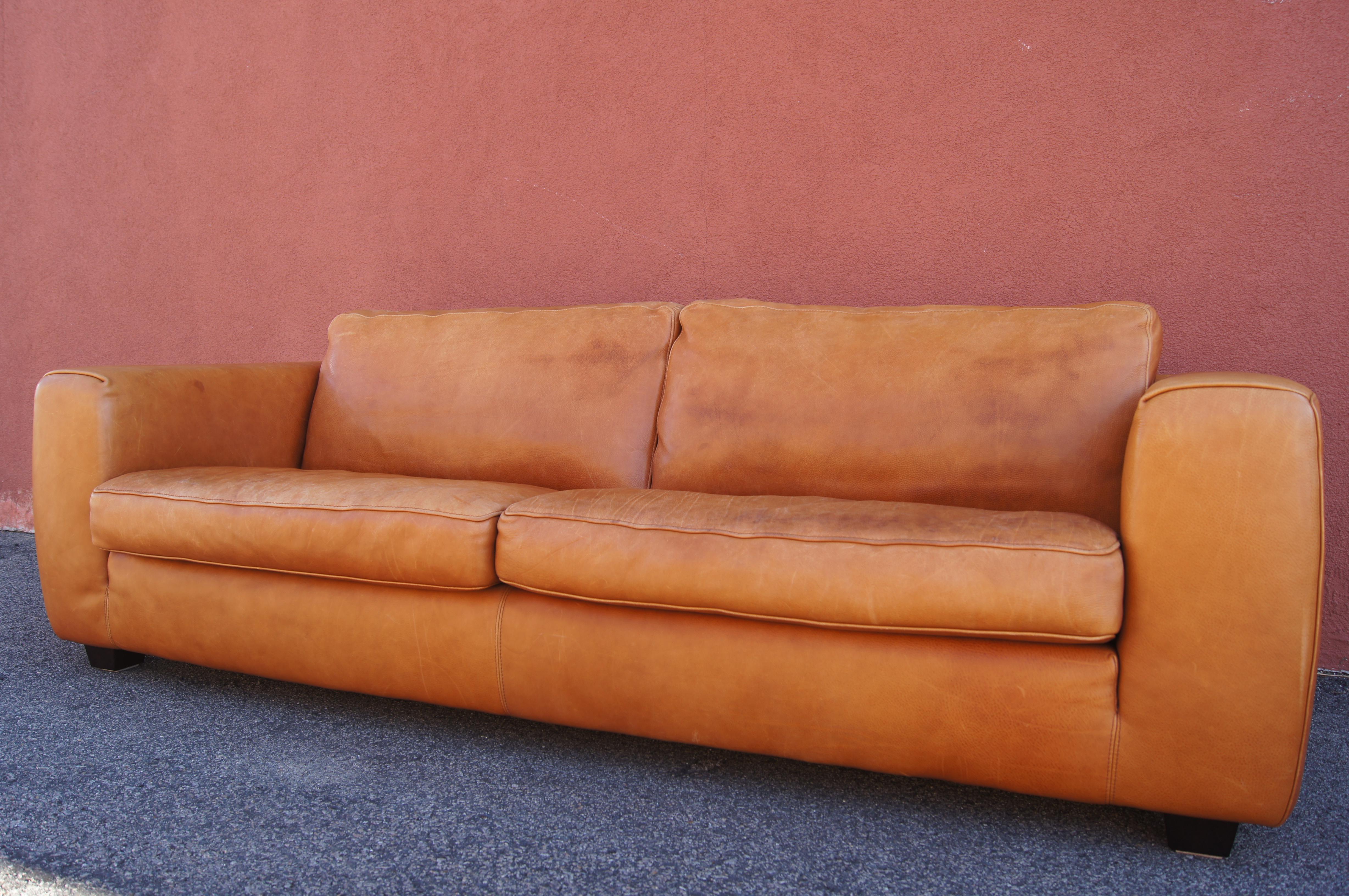 Designed for the Dutch furniture company Linteloo Lab, the Senza Tempo M Sofa is, as its name declares, timeless. The deeply comfortable two-seater, upholstered in a warm brown leather with wide armrests and blocky wooden feet, would complement both