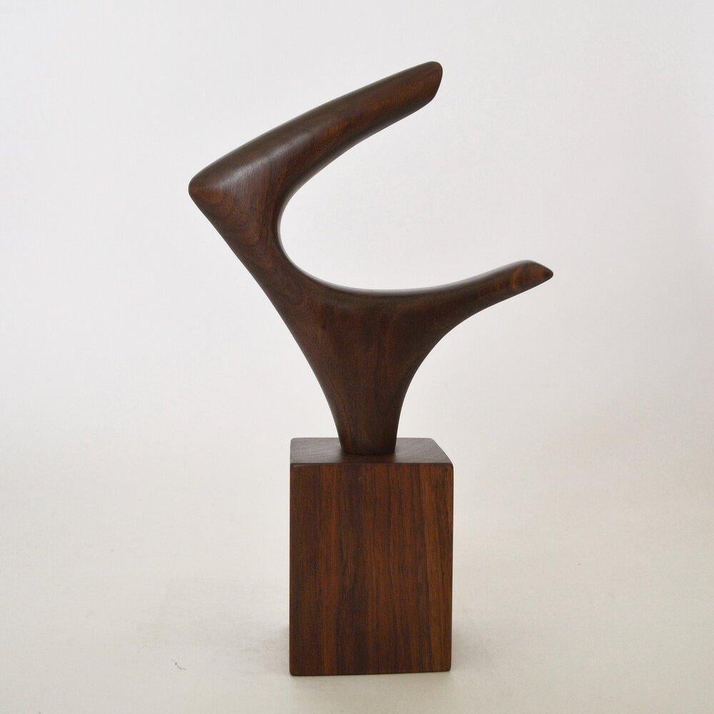 Seonaidh Sculpture by Chandler McLellan
Limited Edition of 10 Pieces.
Dimensions: D 8.9 x W 24.1 x H 38.1 cm. 
Materials: Walnut.

Sculptures will be signed and numbered on the bottom of the base. Wood grain will vary, wood species will not. Please