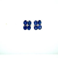 September Birthstone Sapphire and Diamond Flower Stud Earrings in 925 Silver