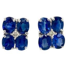 September Birthstone Sapphire and Diamond Flower Stud Earrings in 925 Silver For Sale