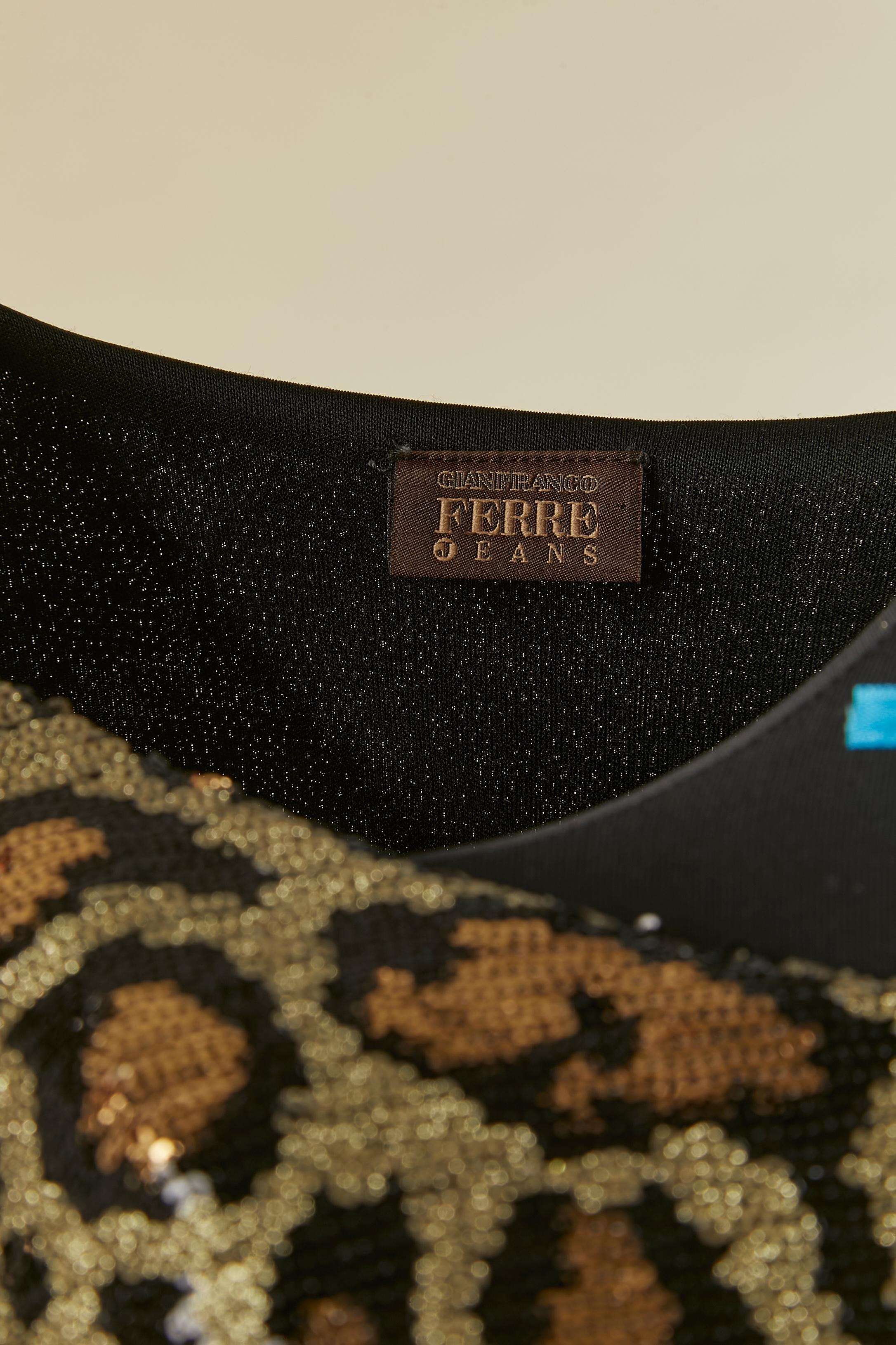 Mini robe de cocktail à paillettes avec motif animalier. Doublure en jersey de polyester noir. 
TAILLE L 