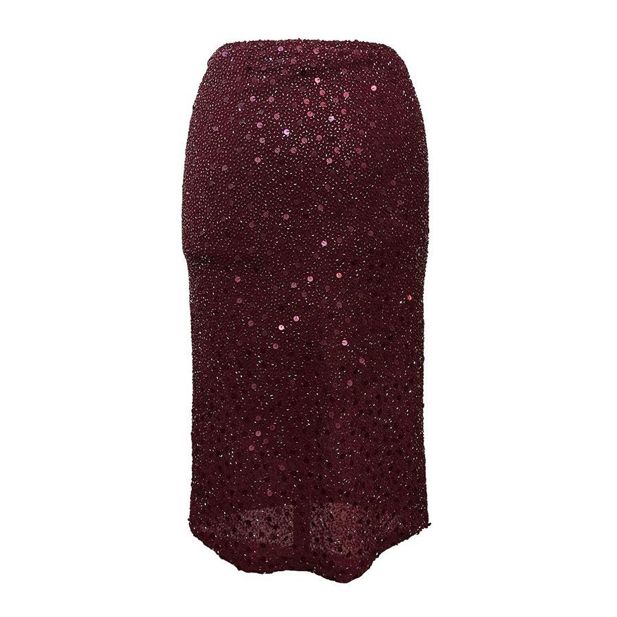 Nylon (85%) Spandex (15%) Bordeaux color Sequins and rhynestones Side zip closure Total lenght cm 64 (2519 inches) Waist cm 34 (1338 inches)
