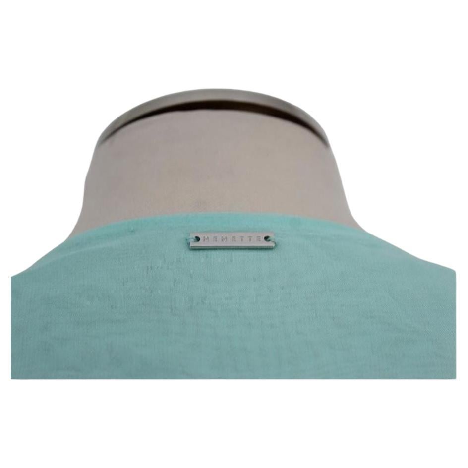 Viscose Aqua green color With sequins V neck with automatic button closure Shoulder length / hem cm 60 (23.62 inches)
