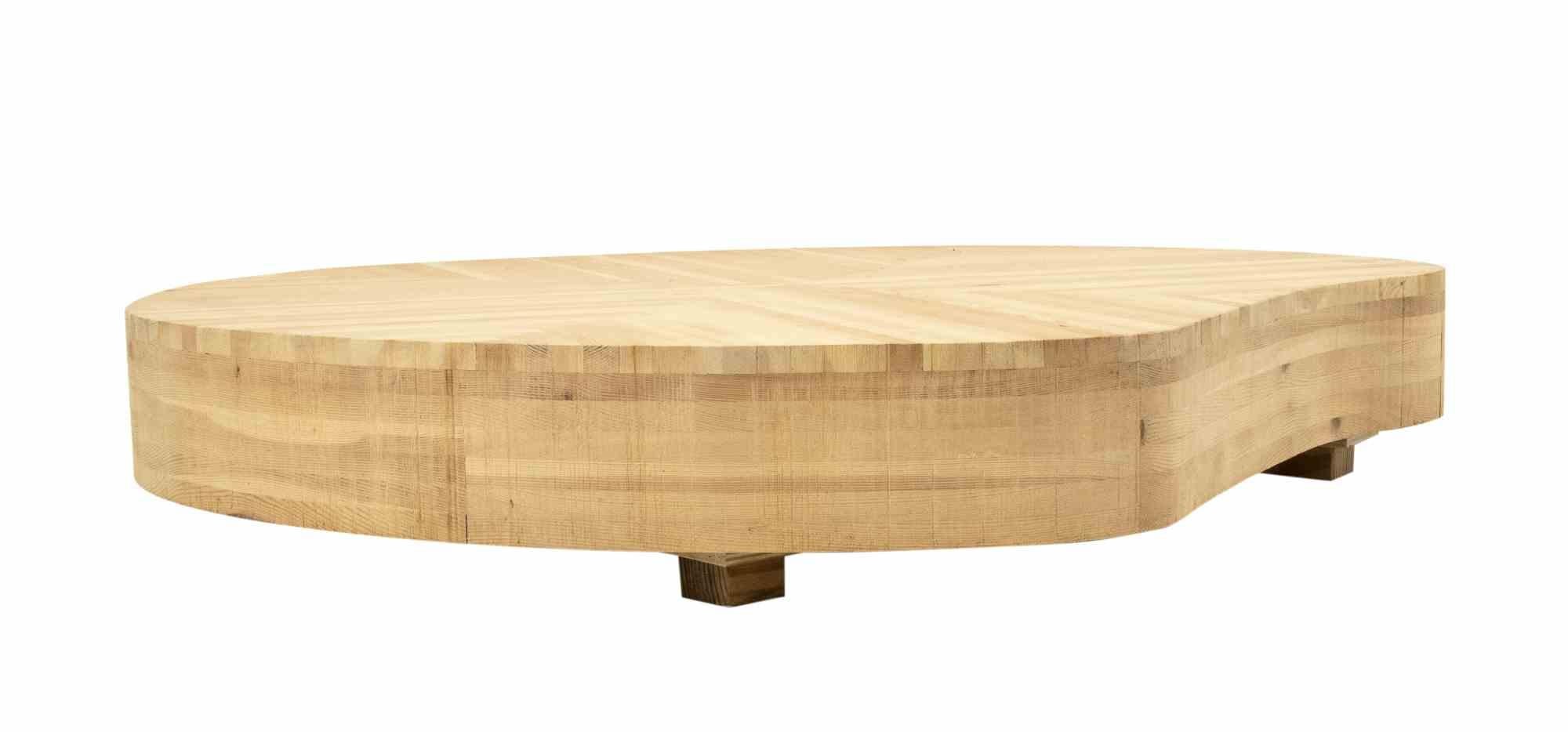 A beautiful coffee table by Italian artist Mario Ceroli. 

All furniture is made of Pine of Russia (a feature that characterizes the creations in wood of the master Mario Ceroli)

Linea Mobili nella Valle.