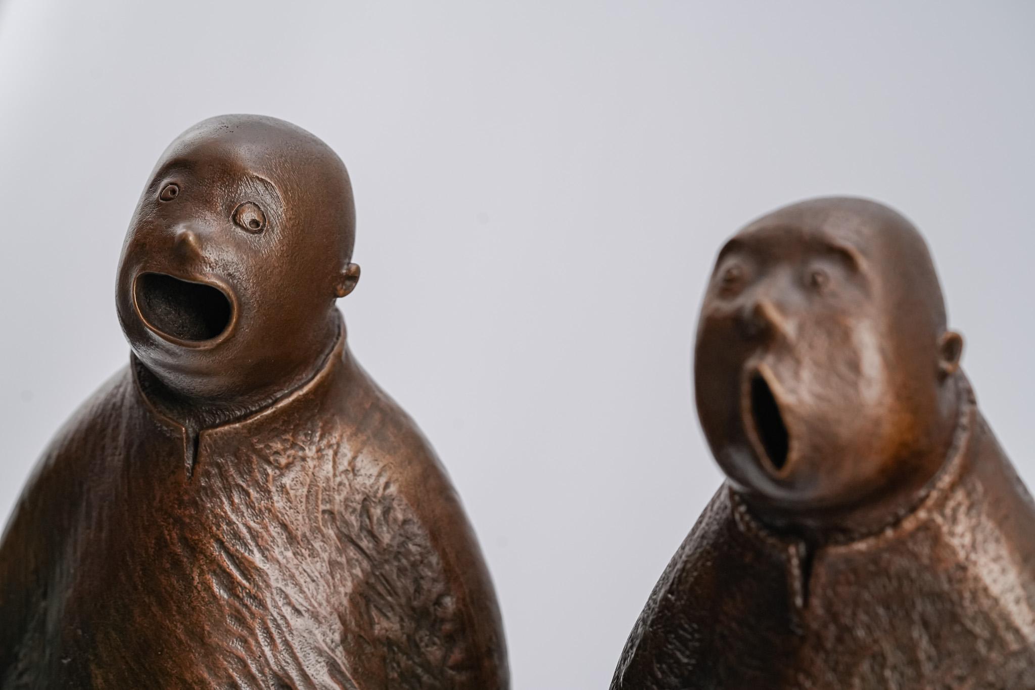 Harmony is a whimsical and lighthearted work that captures the playful spirit of a group chorus. The three figures, each with a distinct mouth shape, appear to be singing in different harmonies. Some sing with a relaxed ease, while others project