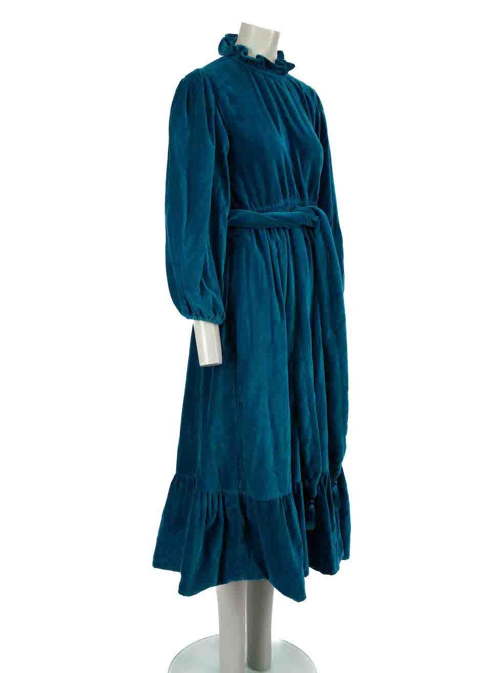 CONDITION is Good. Minor wear to dress is evident. Light pilling to overall fabric especially on the skirt of the dress on this used Seraphina designer resale item.
 
Details
Teal
Velvet
Maxi dress
Mock ruffles neckline
Tie strap belted
Elasticated