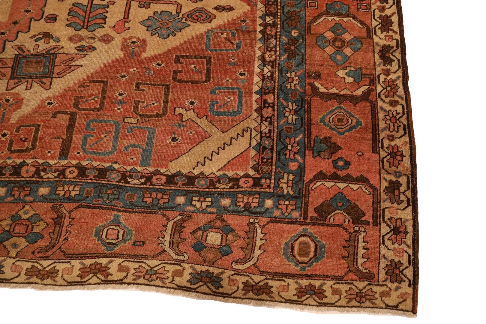 Introducing the Elegance of the Antique Serapi Room Size Rug

Envelop your living space in timeless beauty with our exquisite Antique Serapi rug, a masterpiece that effortlessly blends tradition with sophistication. This room-sized rug boasts a