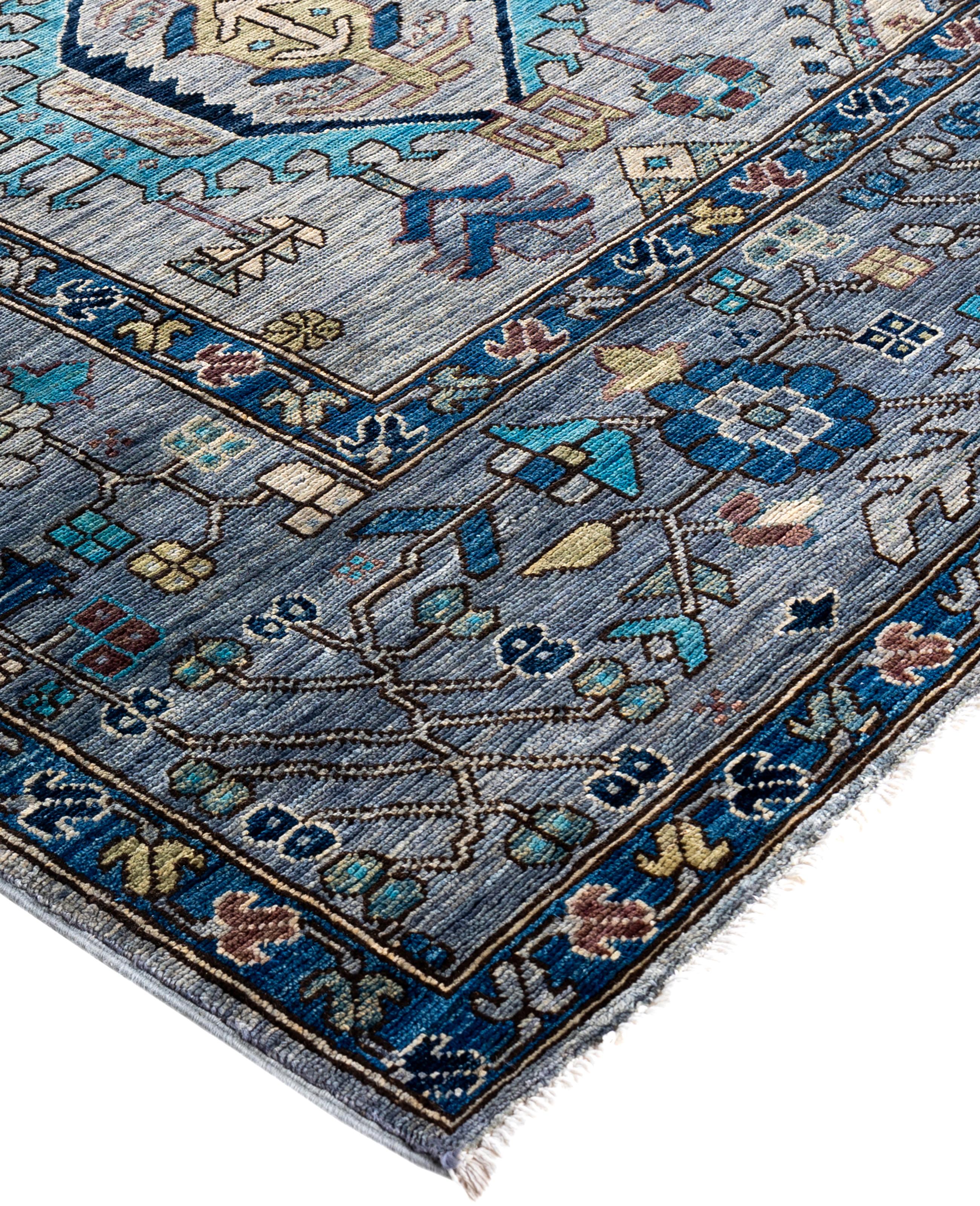 Serapi rugs are known for their bold, geometric designs and rich colors, often featuring a central medallion surrounded by intricate patterns. They typically use a warm, earthy color palette with deep reds, blues, ivory, and occasional greens. The