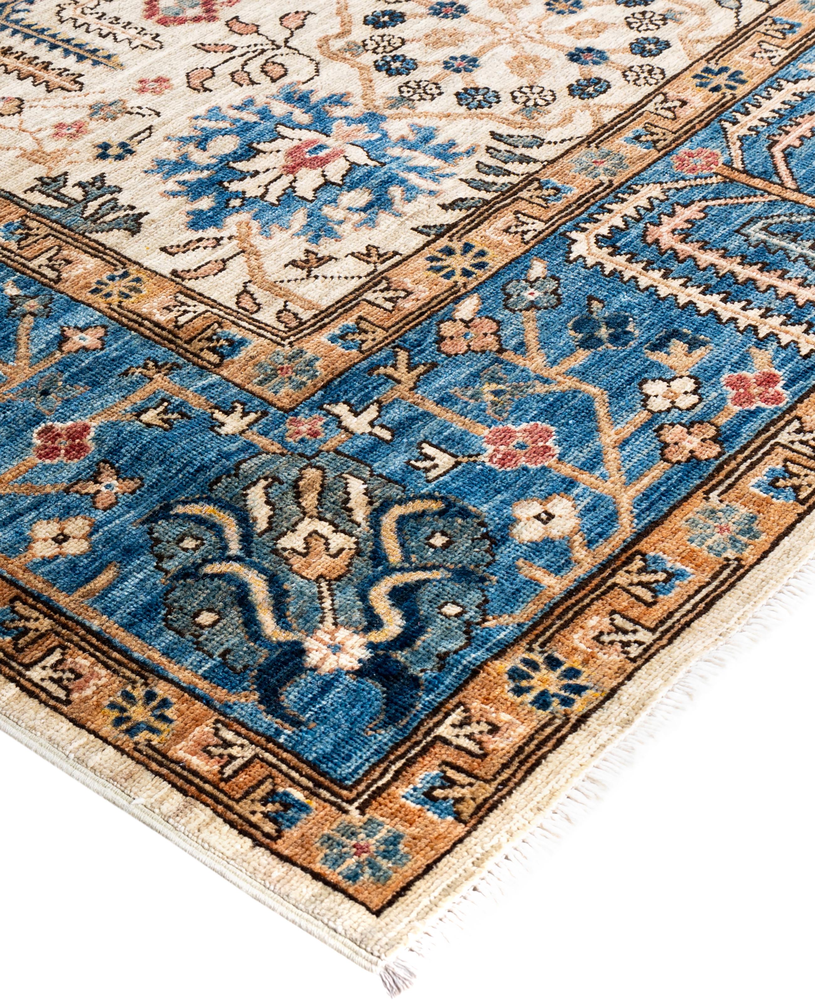 Serapi rugs are known for their bold, geometric designs and rich colors, often featuring a central medallion surrounded by intricate patterns. They typically use a warm, earthy color palette with deep reds, blues, ivory, and occasional greens. The