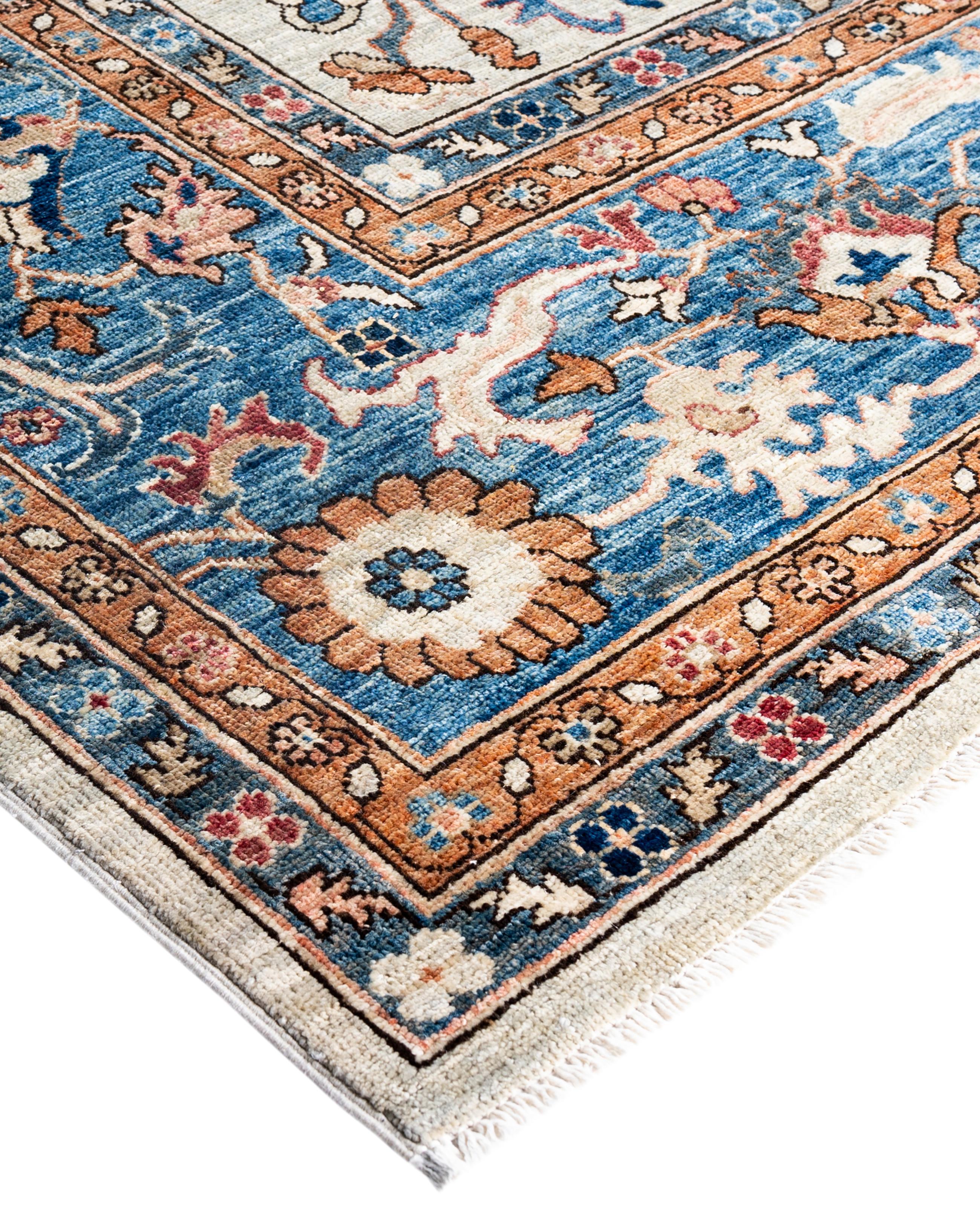Serapi rugs are known for their bold, geometric designs and rich colors, often featuring a central medallion surrounded by intricate patterns. They typically use a warm, earthy color palette with deep reds, blues, ivory, and occasional greens. The