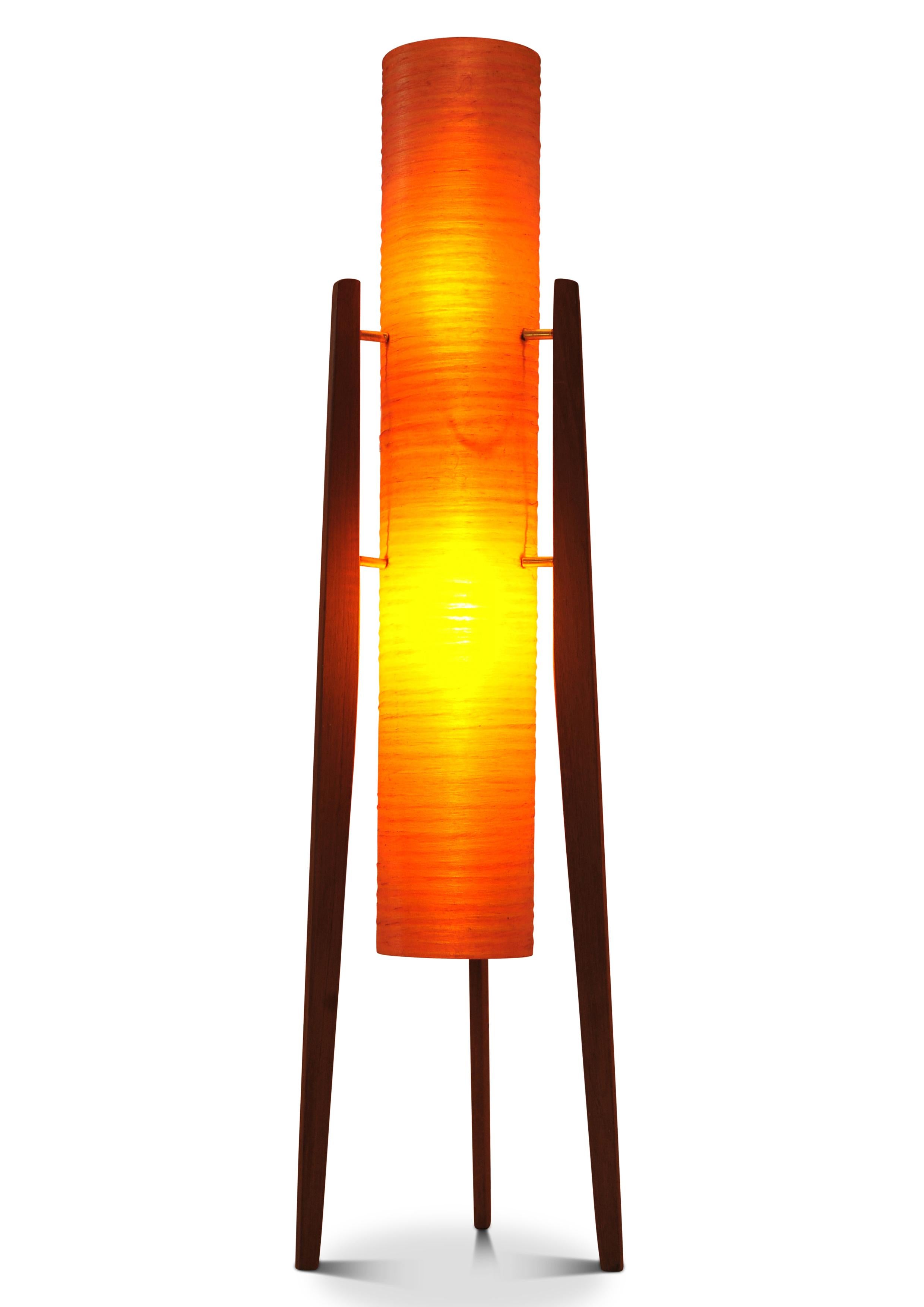 Mid Century Modern Rocket Floor Lamp with a Tripod Teak Frame by Sered Novoplast of Czechoslovakia 1960's
No makers marks or labels

Fitted with a UK plug 

Full height 94cm
Diameter of orange tube 12.5cm
Widest part at wood 22cm
Deepest part at