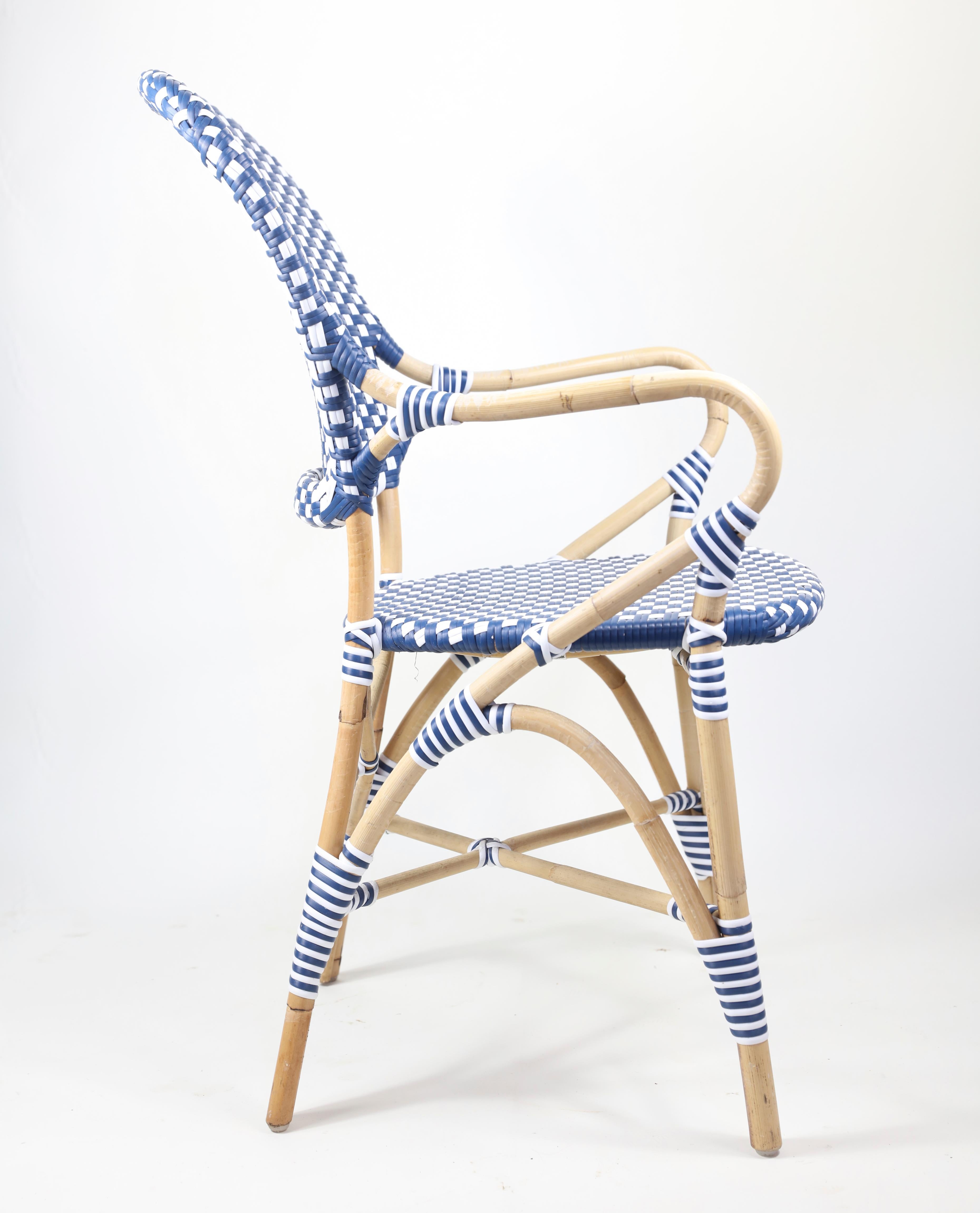 Pair of blue and white Serena and lily woven chairs.

Measures: 35