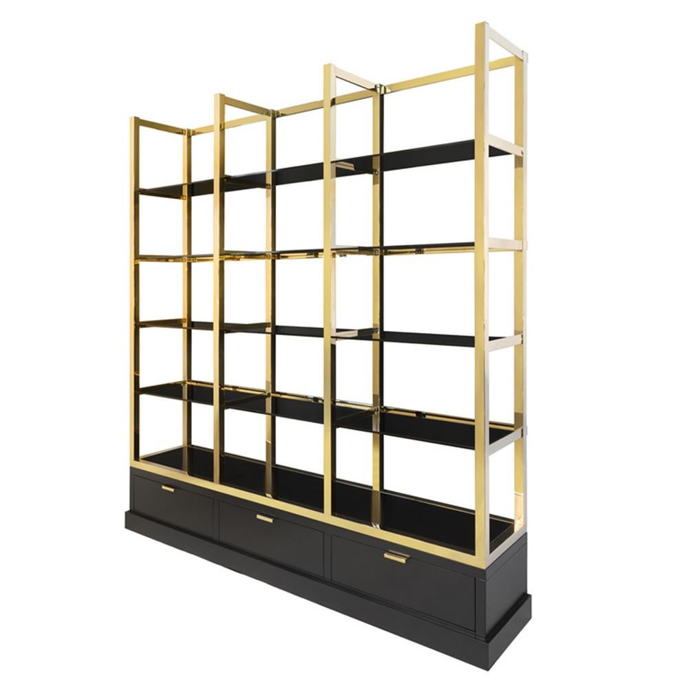 Bookcase Serena Gold with steel structure in
gold finish, with shelves in smoke glass. Base
in solid wood in black Finnish with 3 drawers
with easy glide system.