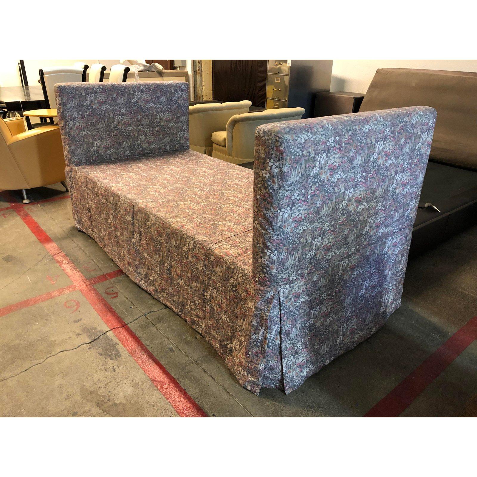 A Presidio daybed with trundle by Serena & Lily. Perfect for grown-up and kids' spaces alike, this versatile shape keeps things simple with clean lines and a tailored slipcover. Propped with added pillows, it becomes a comfy spot to lounge by day.