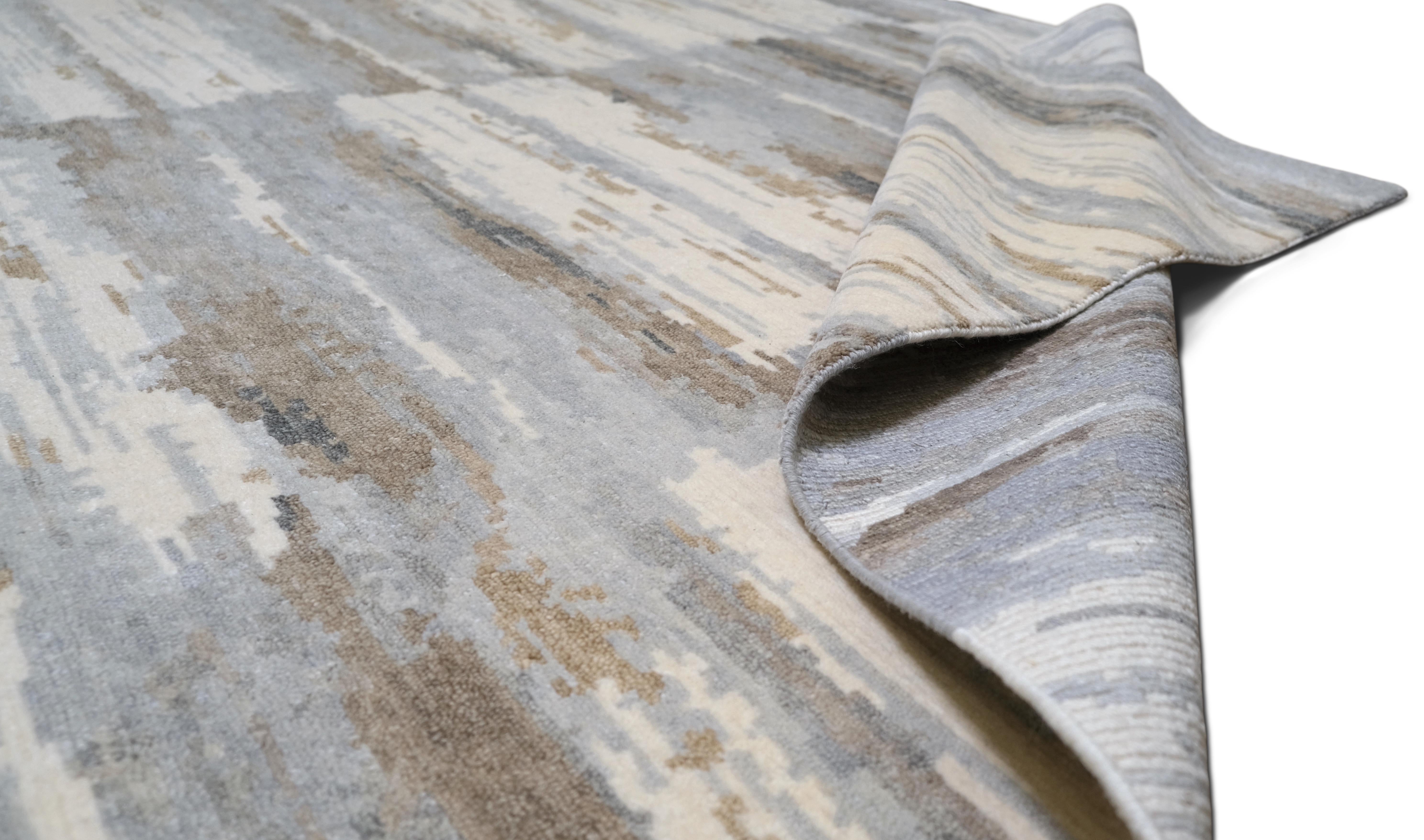 Featuring a sophisticated abstract pattern in a neutral palette of Blue grey, beige, and ivory. The design exudes a tranquil yet modern aesthetic, with subtle texture and tonal variations that create depth and visual interest, making it an excellent