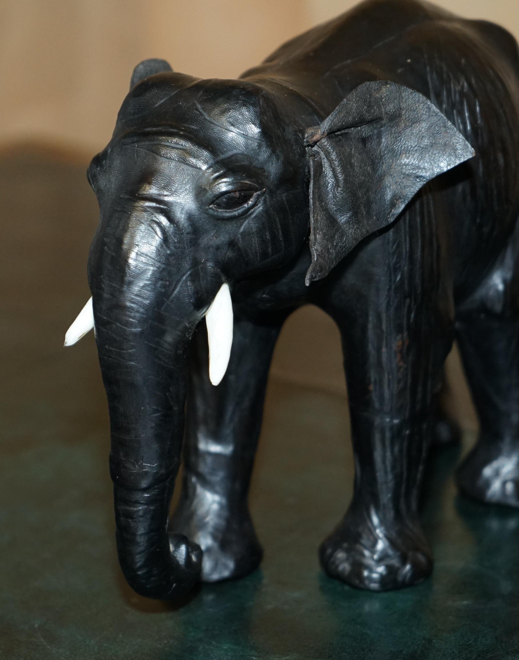 SERENE LOOKING LiBERTY'S LONDON LEATHER ELEPHANT FOOTSTOOL STOOL GLASS EYES For Sale 4