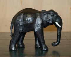 SERENE LOOKING LiBERTY'S LONDON LEATHER ELEPHANT FOOTSTOOL STOOL GLASS EYES