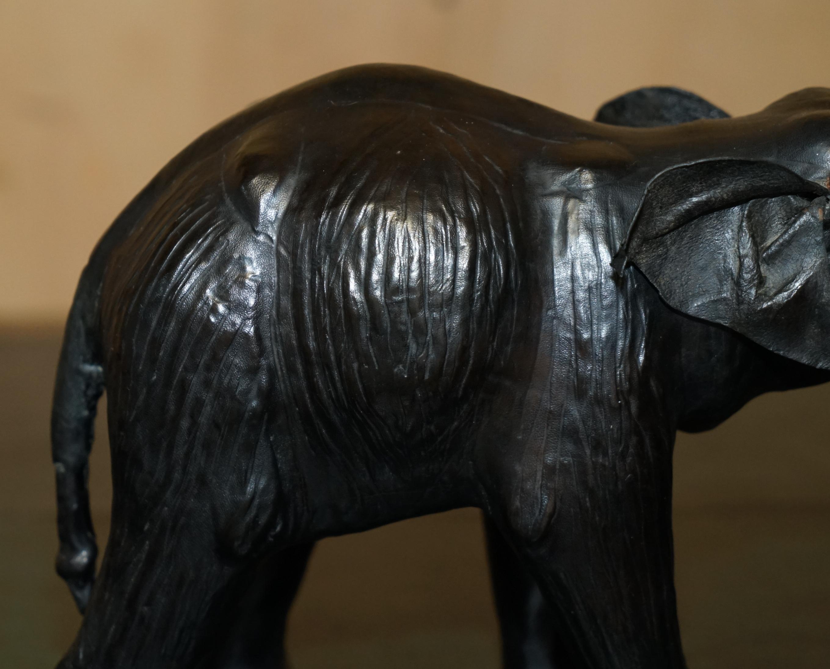 Hand-Crafted SERENE LOOKING LiBERTY'S LONDON LEATHER ELEPHANT FOOTSTOOL STOOL GLASS EYES For Sale