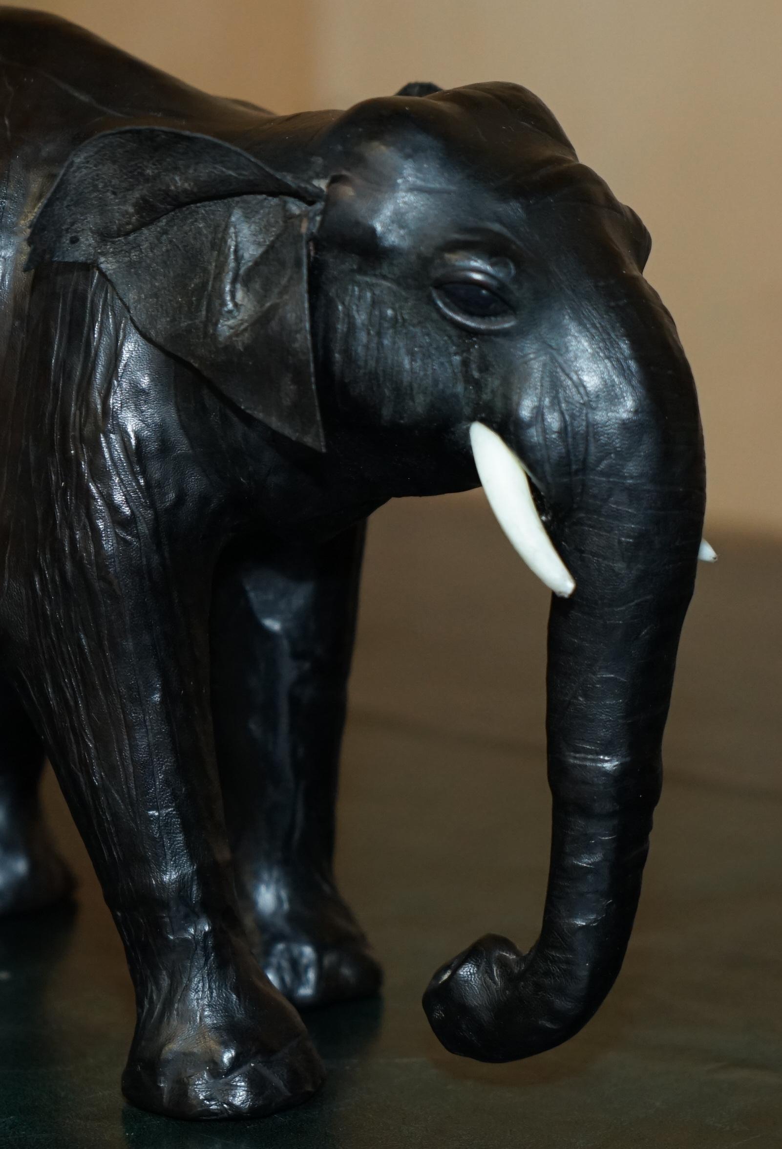 SERENE LOOKING LiBERTY'S LONDON LEATHER ELEPHANT FOOTSTOOL STOOL GLASS EYES In Good Condition For Sale In West Sussex, Pulborough