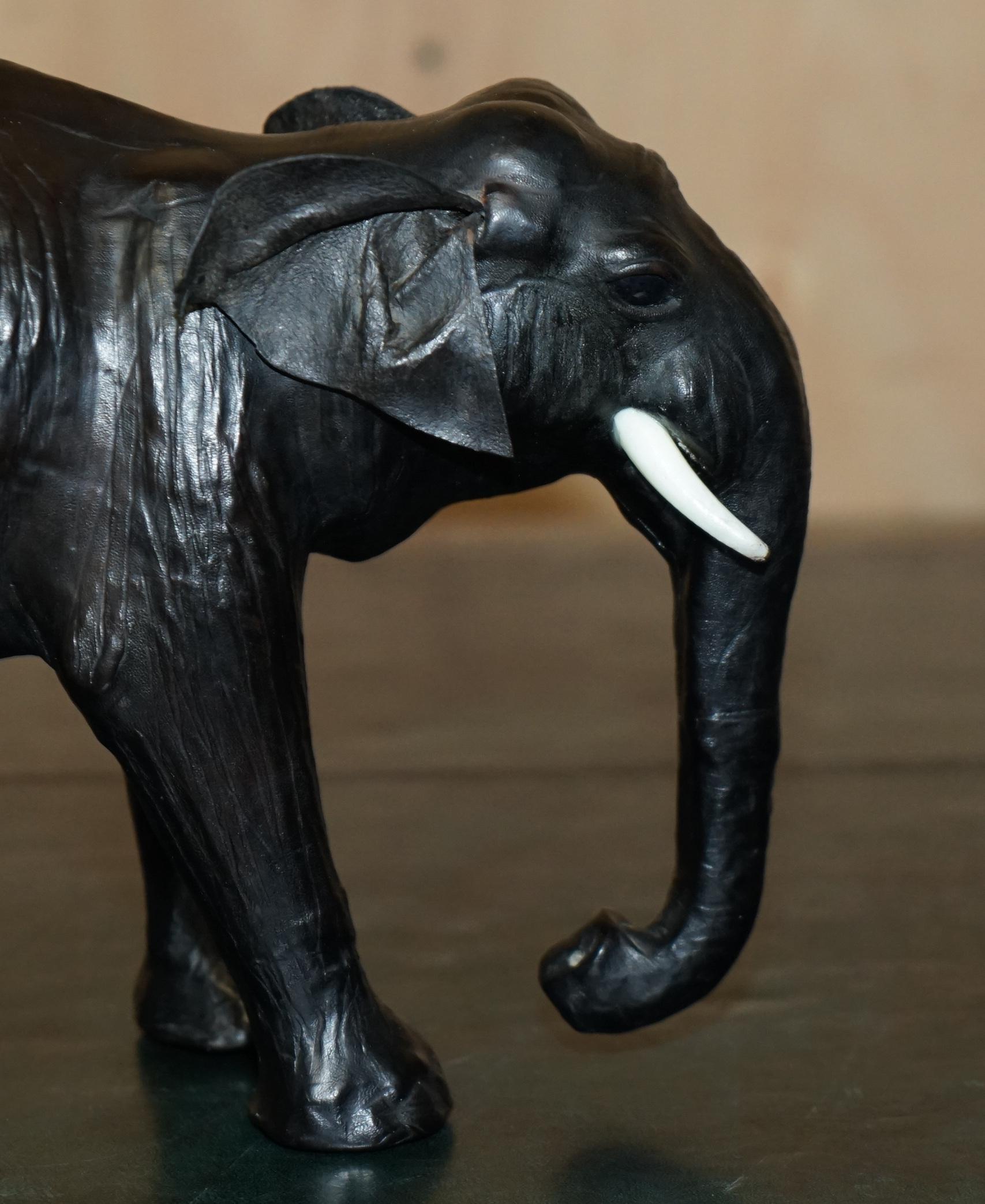 Mid-20th Century SERENE LOOKING LiBERTY'S LONDON LEATHER ELEPHANT FOOTSTOOL STOOL GLASS EYES For Sale