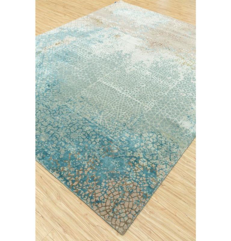 Ever dreamt of bringing the serene hues of rural India into your modern sanctuary? Dive into the captivating allure of the Tattvam rug from the Gauri Khan collection. Hand-knotted with meticulous precision in rural India, each piece whispers untold