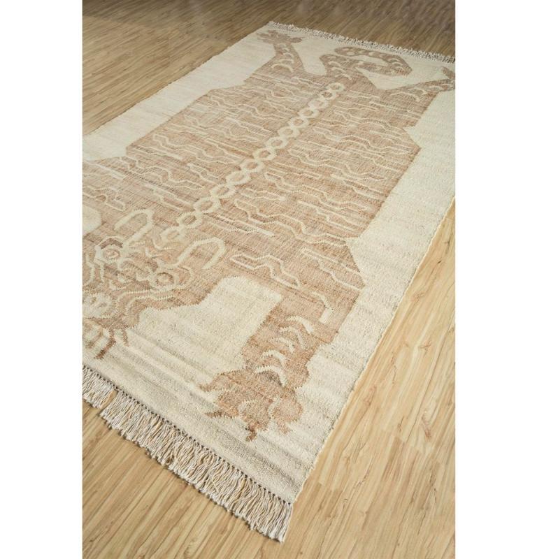 What if simplicity could speak volumes? Introducing our Flatweave rug, a masterpiece of minimalism and understated elegance. Its unembellished patterns and subtle gradients, blending seamlessly from natural to off-white, evoke a sense of tranquil