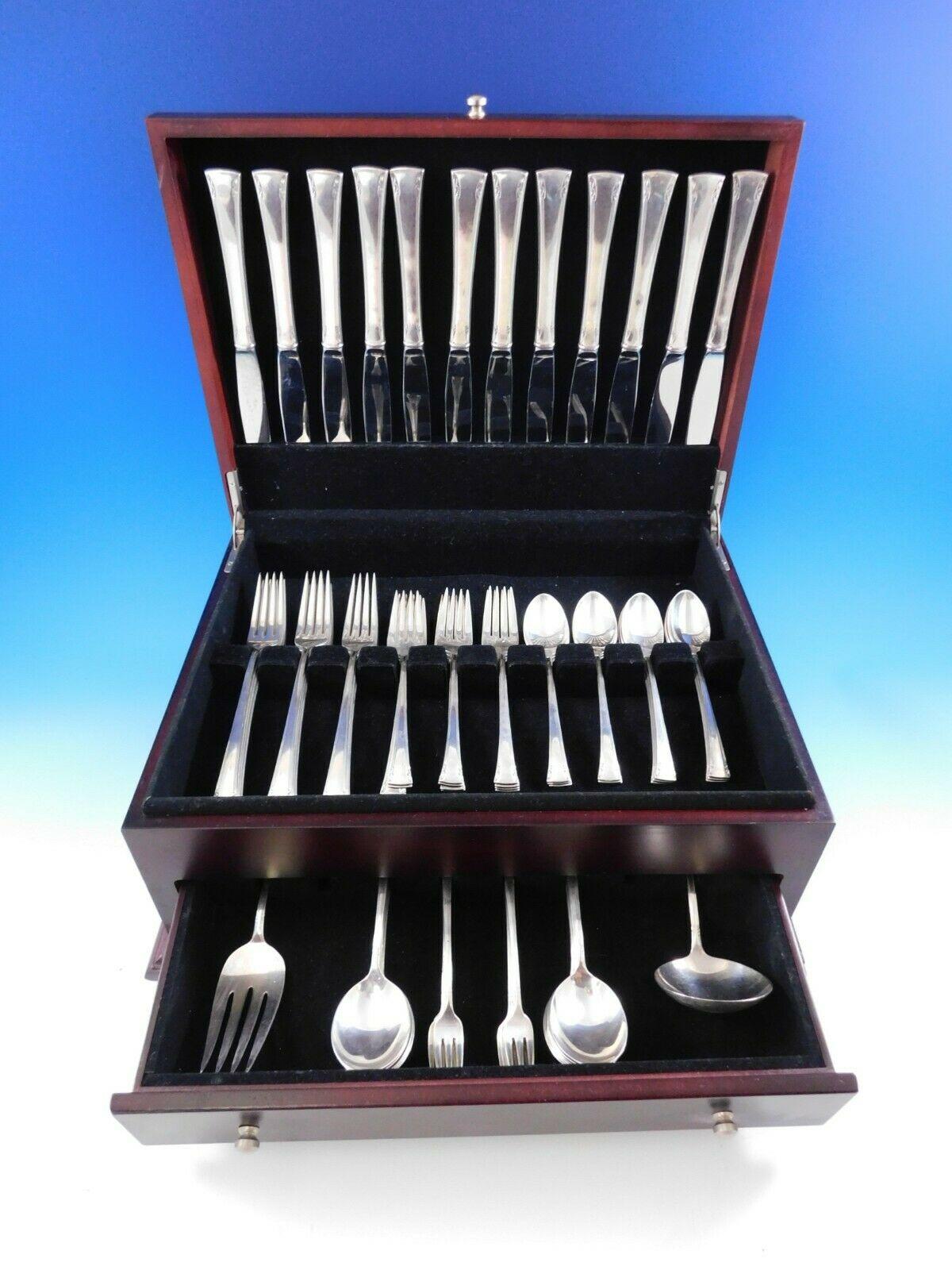 Dinner size serenity by International sterling silver flatware set, 74 pieces. This set includes:

12 dinner size knives, 9 1/2