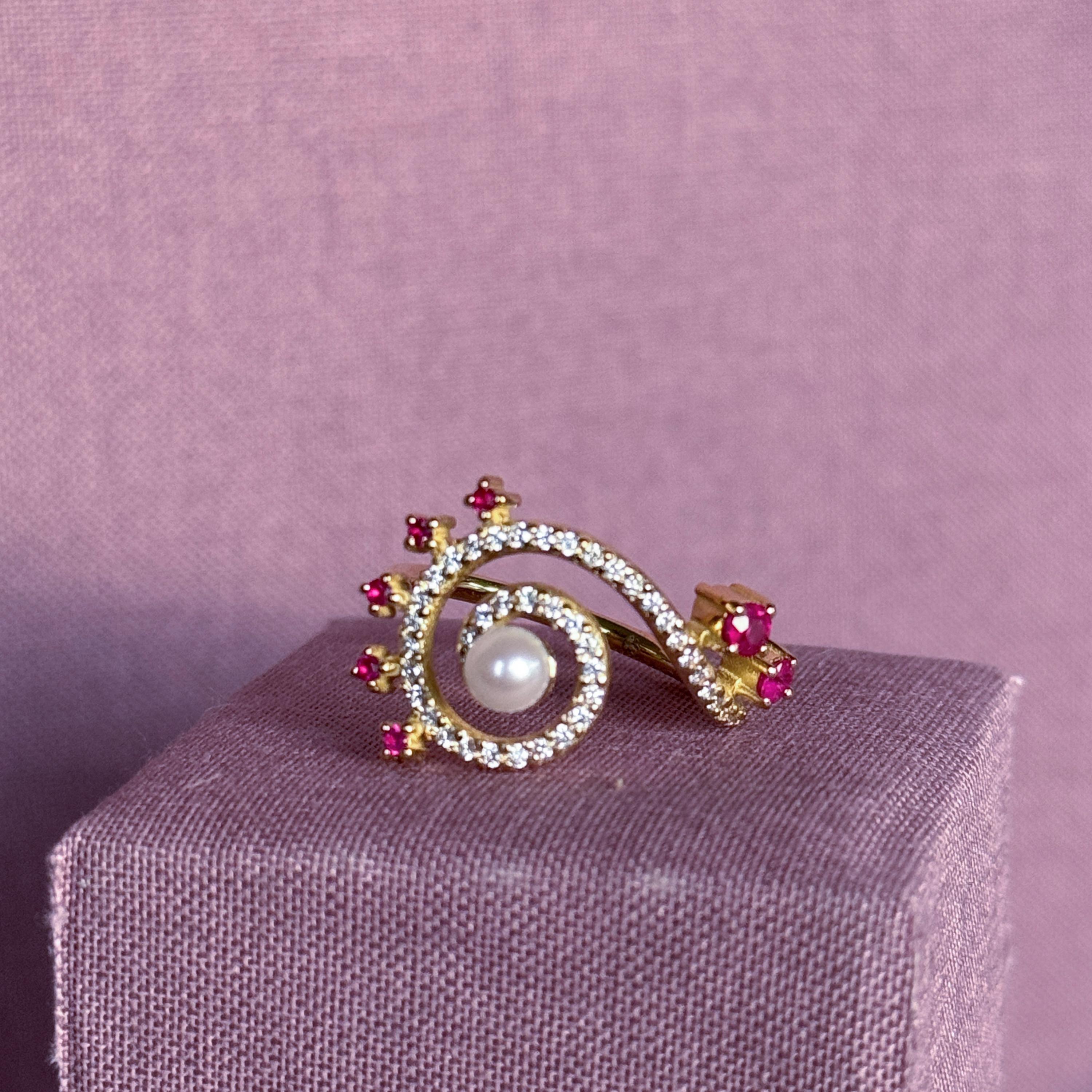 Contemporary Serenity Index Finger Ring in 18 Karat Gold with Diamonds, Rubies And A Pearl