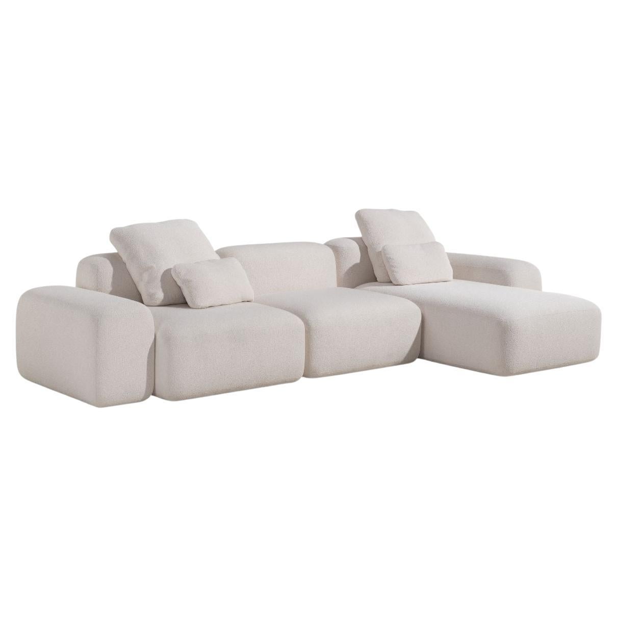 The Serenity sofa is a masterpiece of modular versatility and comfort. 

Designed with timeless elegance, it blends effortlessly into any environment while maintaining its sophisticated charm. This piece not only serves as a stunning focal point,