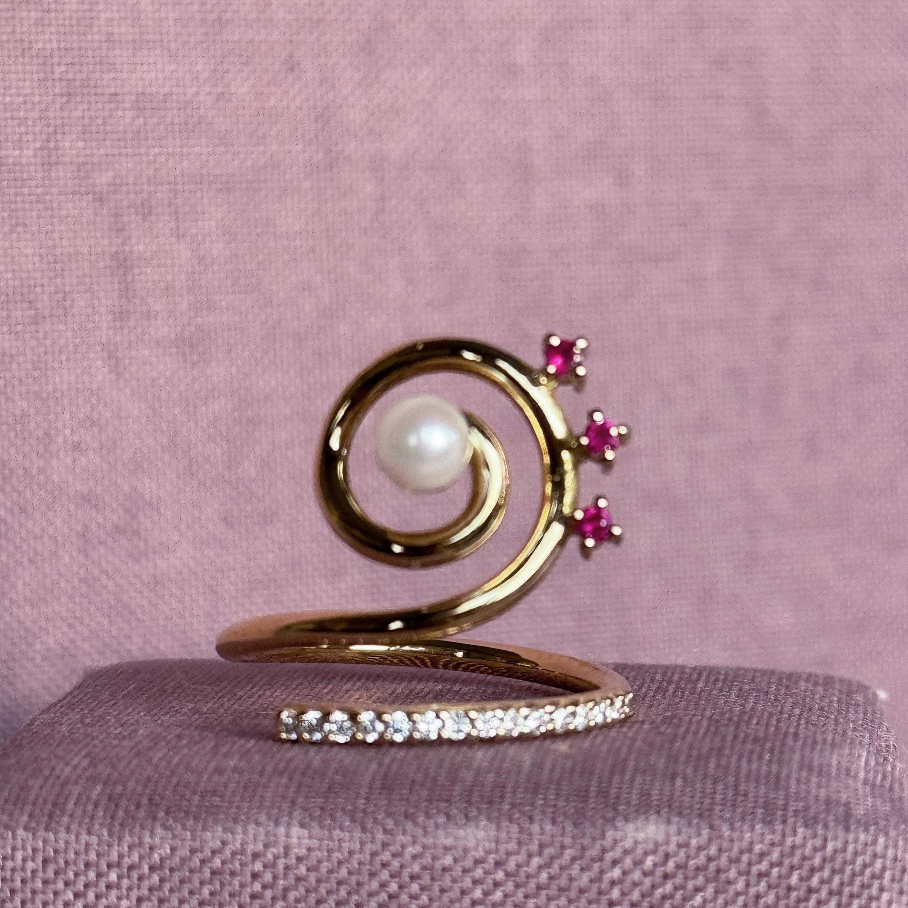 Contemporary Serenity Ring in 18 Karat Gold with Diamonds, Rubies And A Pearls For Sale