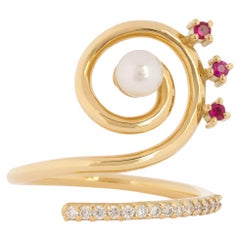 Serenity Ring in 18 Karat Gold with Diamonds, Rubies And A Pearls