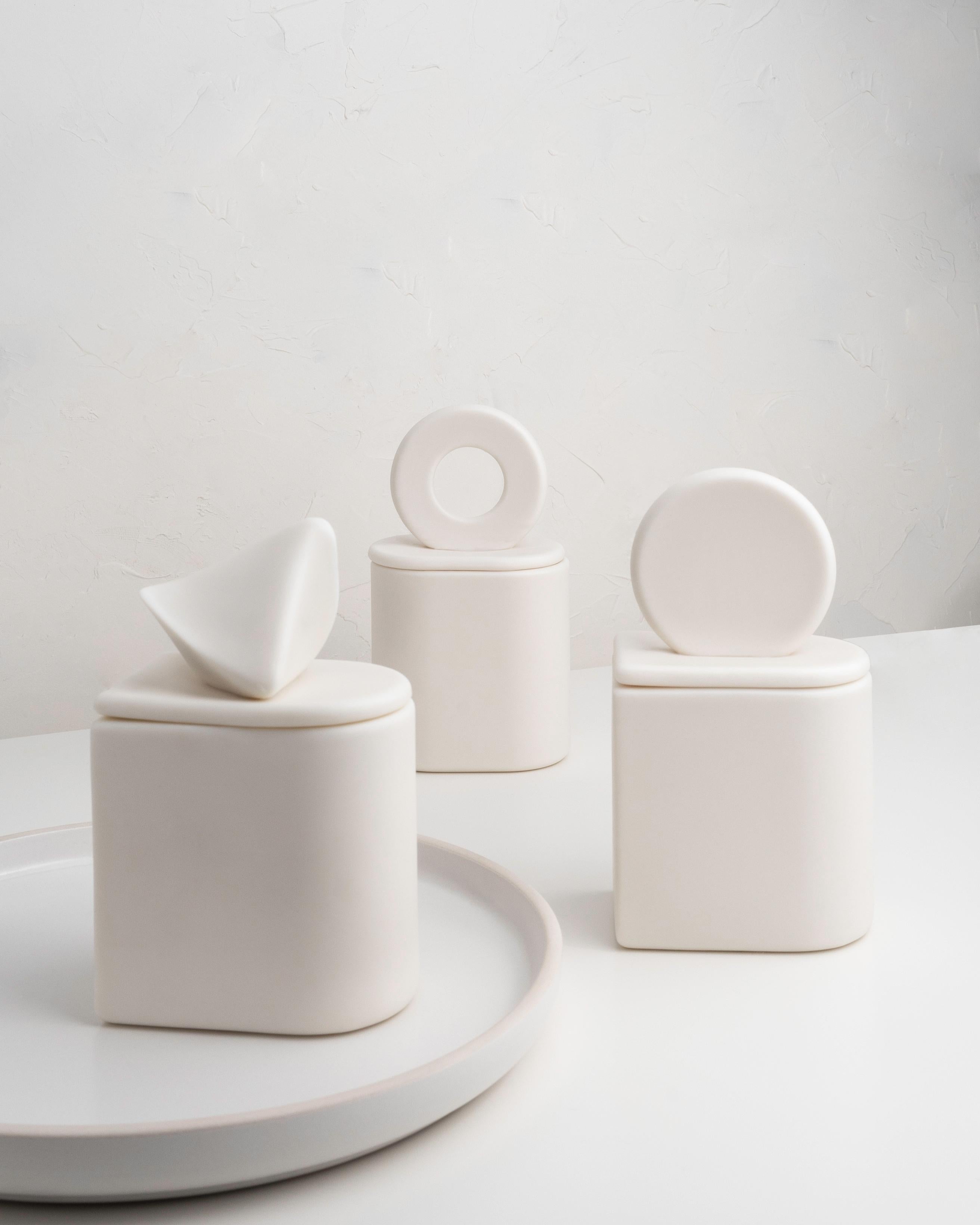 Uneven. A minimalist ceramic container, Parian porcelain. 

A collection inspired by nature and classical forms.

Parian porcelain vessels, unglazed.

• 160 g natural soy wax

• app 30 h burn time

• wooden wick

• fragrance oils
