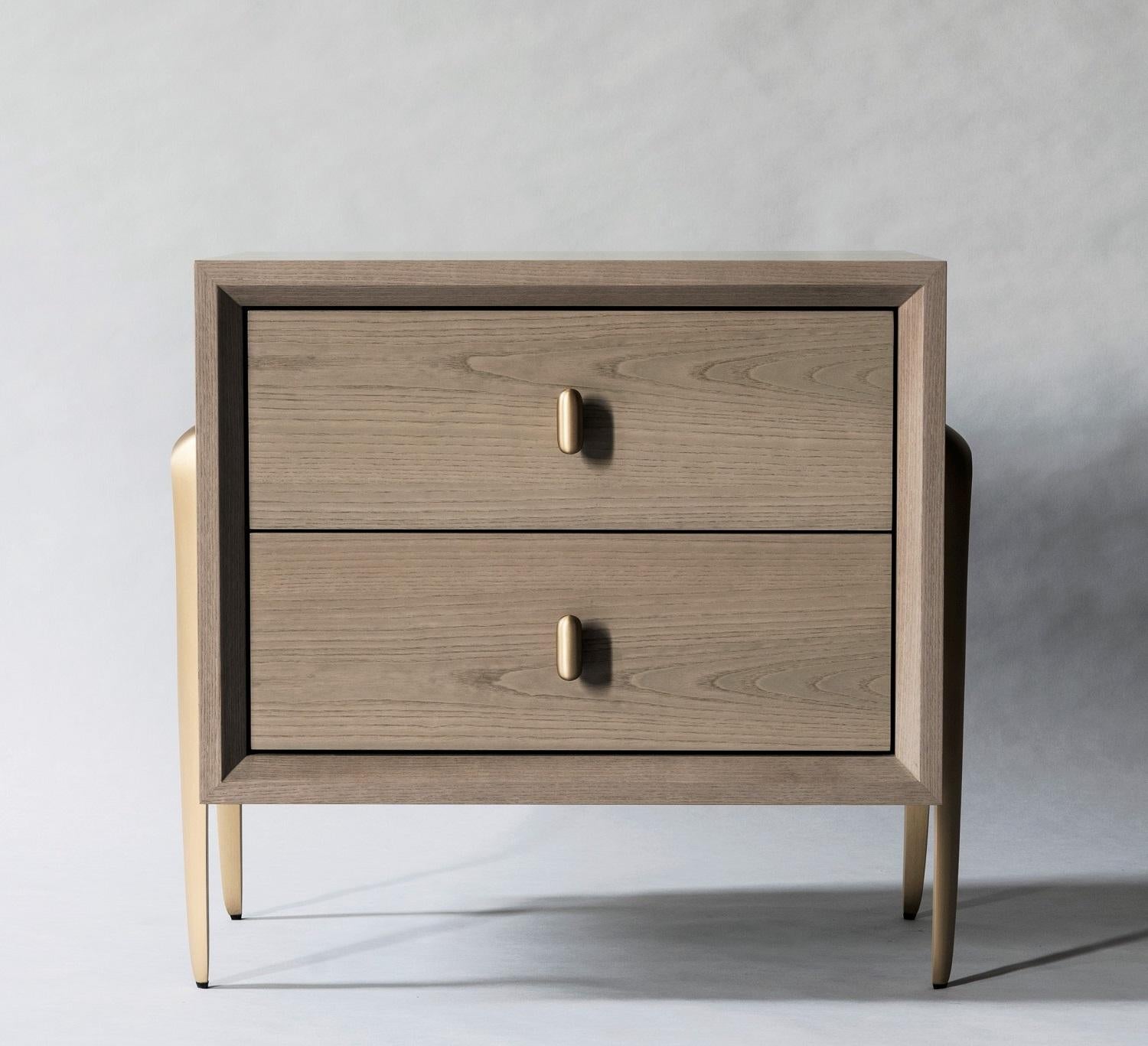 Informed by the refined craftsmanship of mid-century Italian design, the Serge Bedside Table features sculptural two-legged brackets, with a gently tapered silhouette and articulated edge. Nuanced millwork - beveled along the interior frame, with