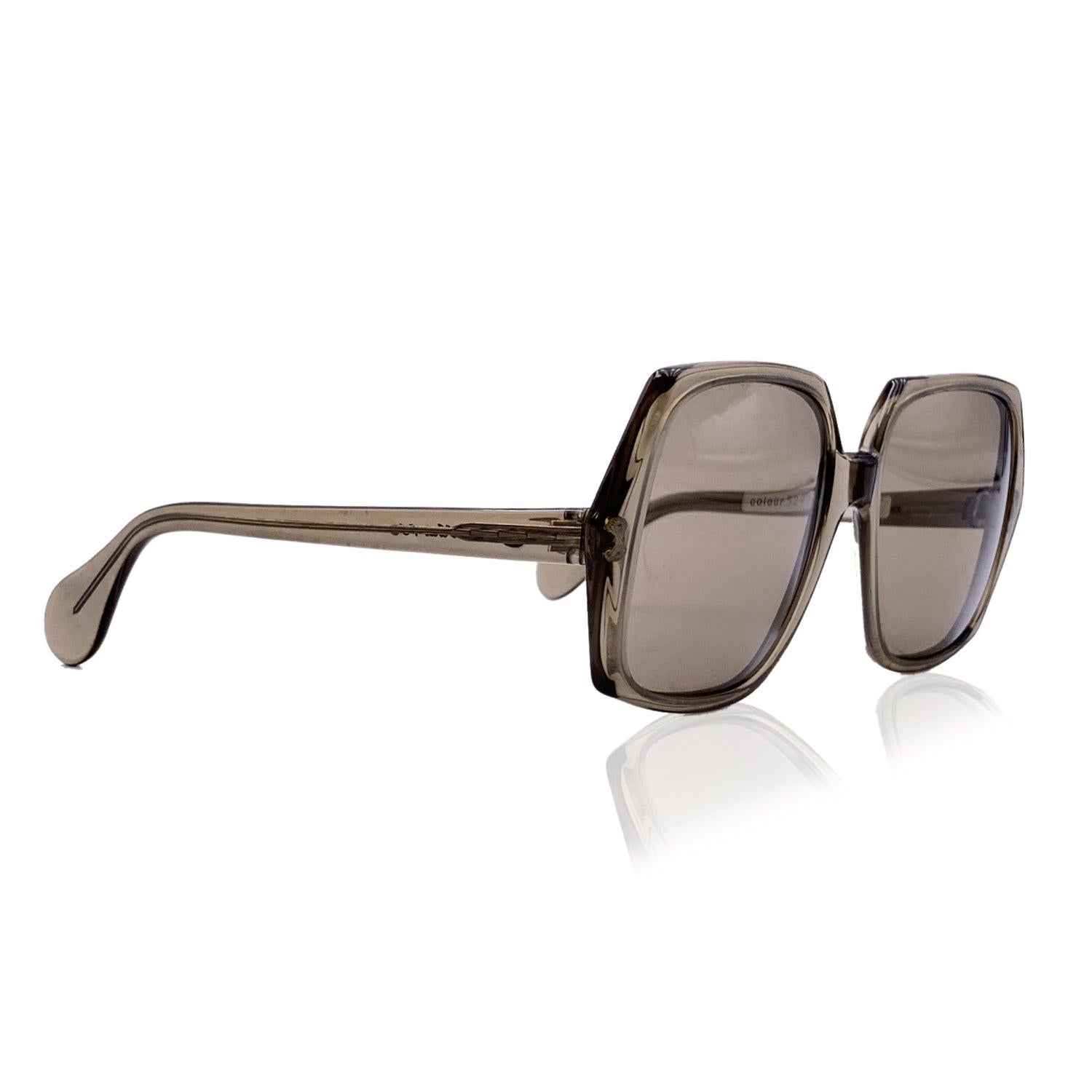 Rare Designer Sunglasses by genious SERGE KIRCHHOFER. Made in Austria, during the early 1970s. Semi transparent oversized squared frame, original light grey 100% UV Lens. Model: 465. They will come with their soft orginal case. Details MATERIAL: