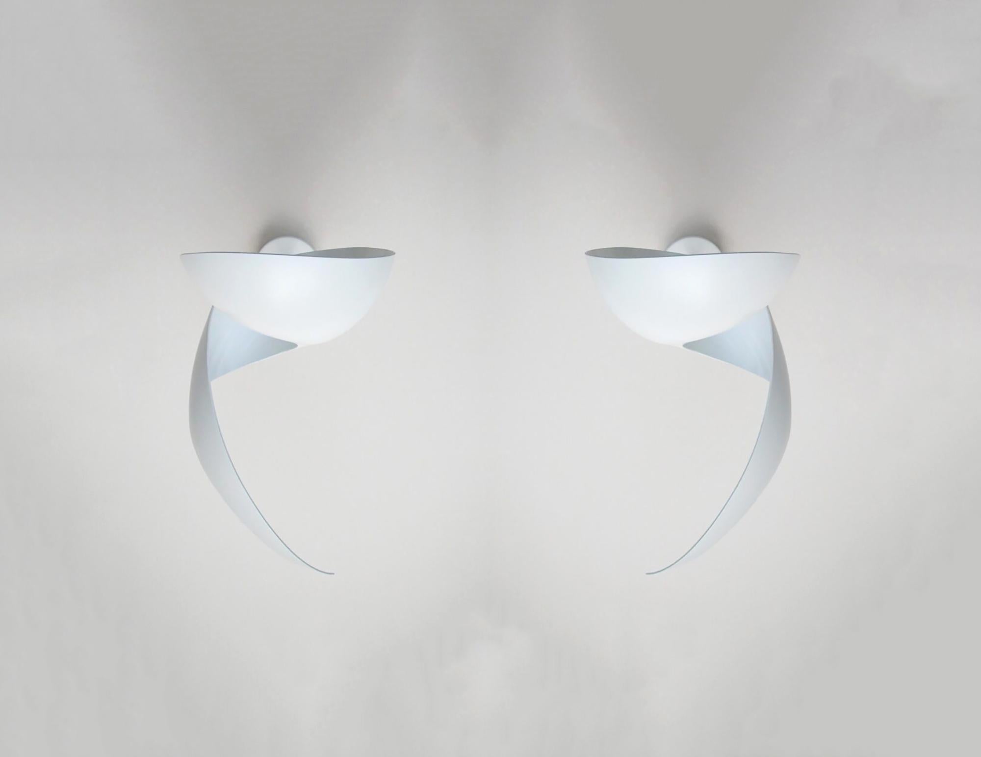 DESCRIPTION:
This listing is created for Julia.

2 pairs of black Flame sconces (left and right swirl)
1 pair of white Flame sconces (left and right swirl)

An elegant twist of metal yields a lamp that illuminates upwards, creating playful shadows