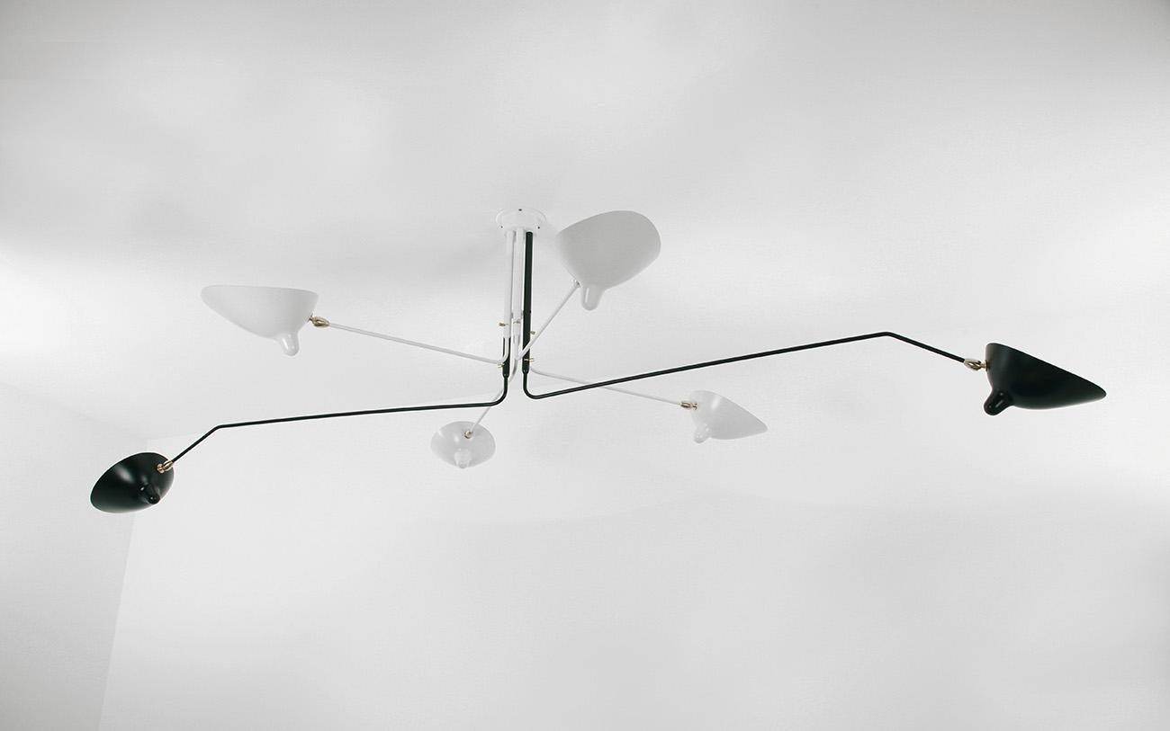 Ceiling lamp model 'Six Rotating Arms Ceiling Lamp' designed by Serge Mouille in 1958.

Manufactured by Editions Serge Mouille in France. The production of lamps, wall lights and floor lamps are manufactured using craftsman’s techniques with the