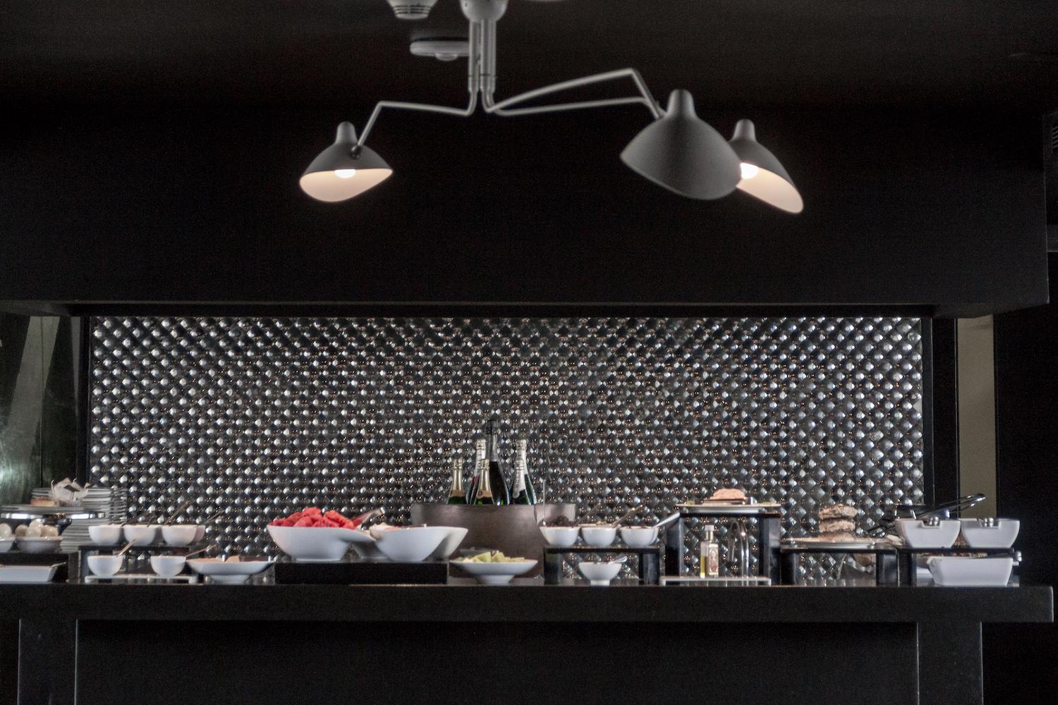 Serge Mouille ceiling lamp with three rotating arms by Les Editions Serge Mouille. Available in black or white.