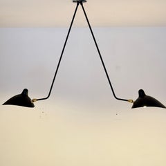 Serge Mouille ceiling pendant for Christian Dior Infirmary  Paris. Available now