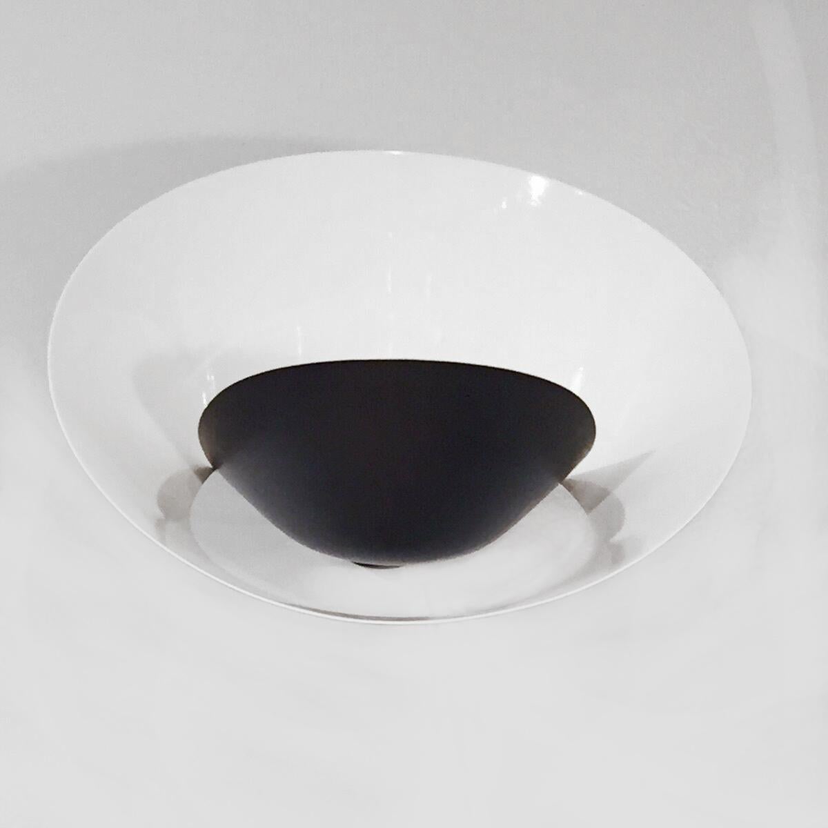 Sconce wall lamp model 'Saturn Wall Lamp' designed by Serge Mouille in 1957.

Manufactured by Editions Serge Mouille in France. The production of lamps, wall lights and floor lamps are manufactured using craftsman’s techniques with the same